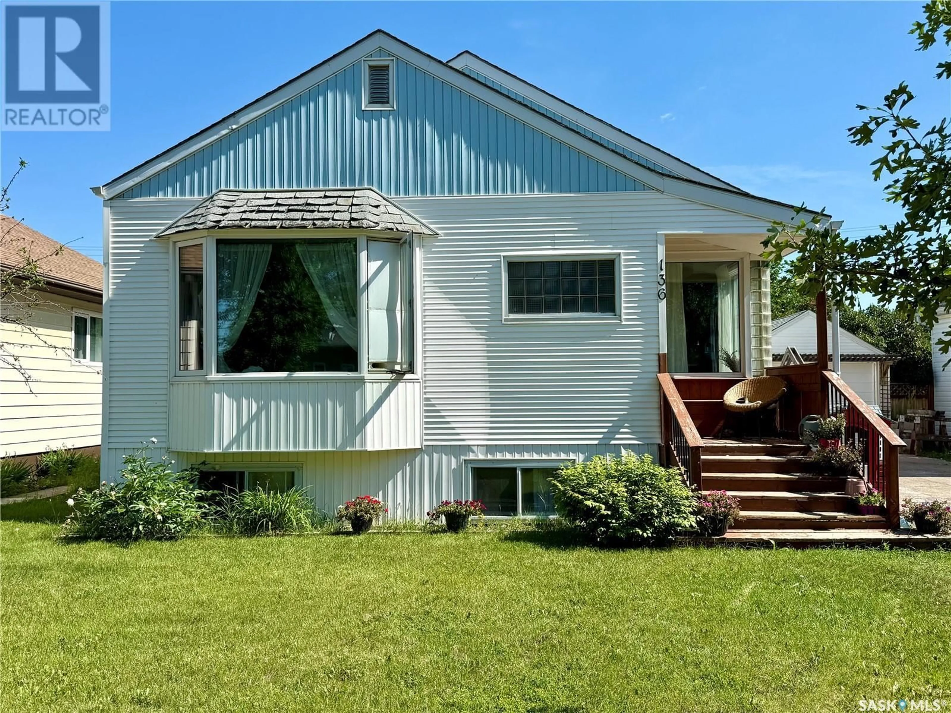 Home with vinyl exterior material, unknown for W - 136 EIGHTH AVENUE, Melville Saskatchewan S0A2P1