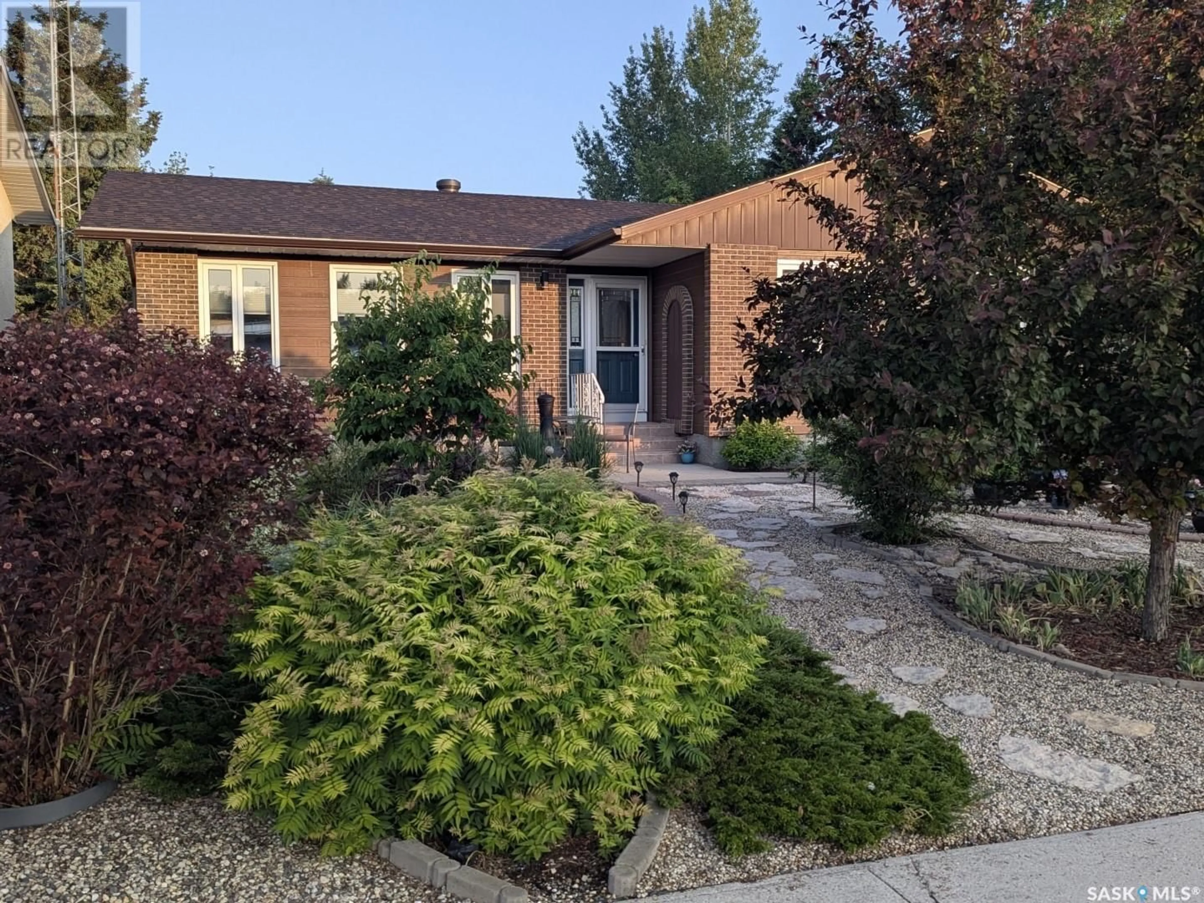 Home with brick exterior material, street for 1225 12TH STREET, Humboldt Saskatchewan S0K2A0