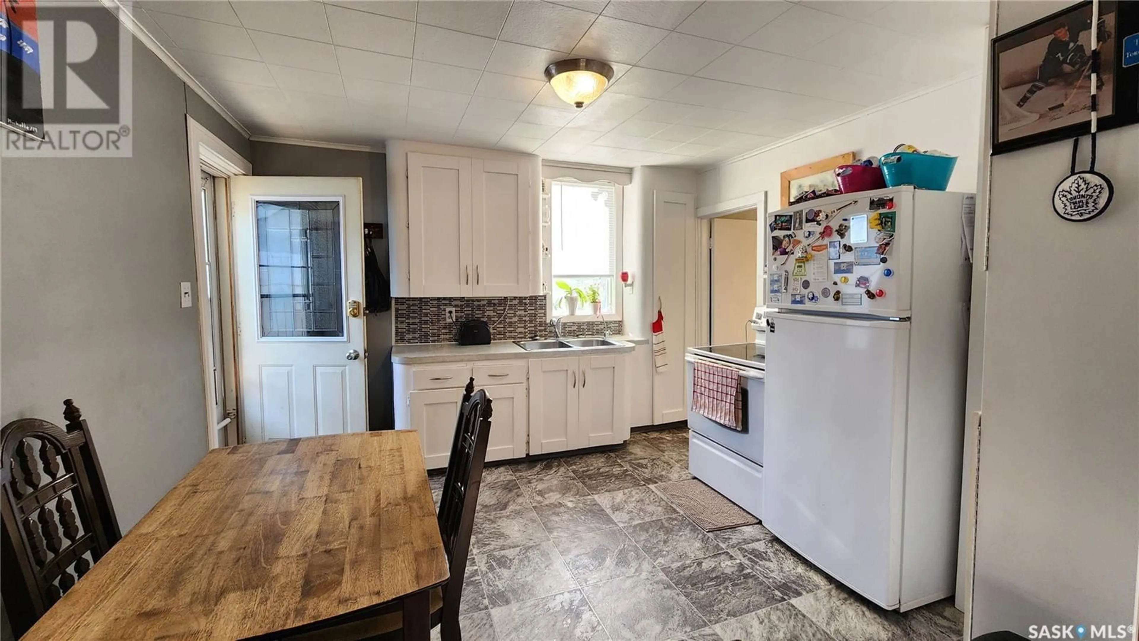 Standard kitchen, ceramic/tile floor for 921 109TH STREET, North Battleford Saskatchewan S9A2E1