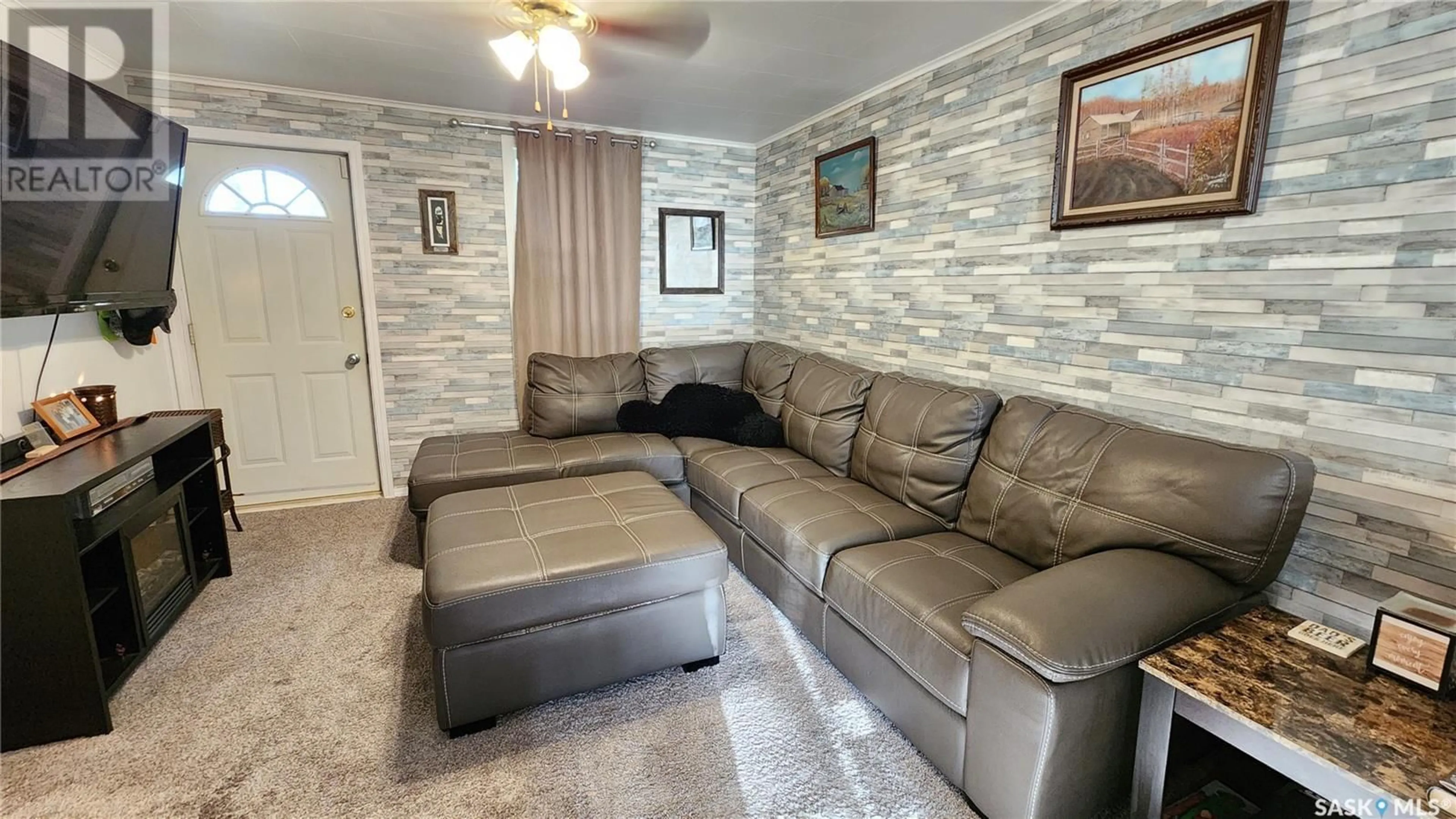 Living room with furniture, unknown for 921 109TH STREET, North Battleford Saskatchewan S9A2E1