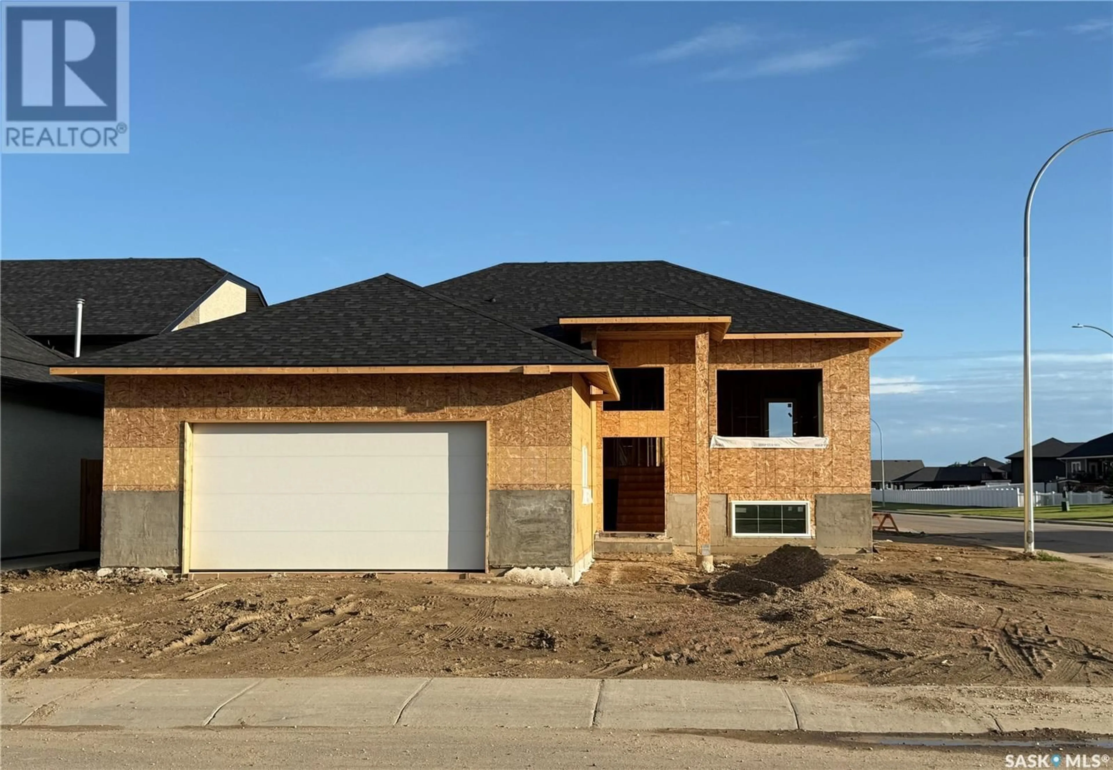 Home with brick exterior material, building for 801 WEIR CRESCENT, Warman Saskatchewan S0K4S4