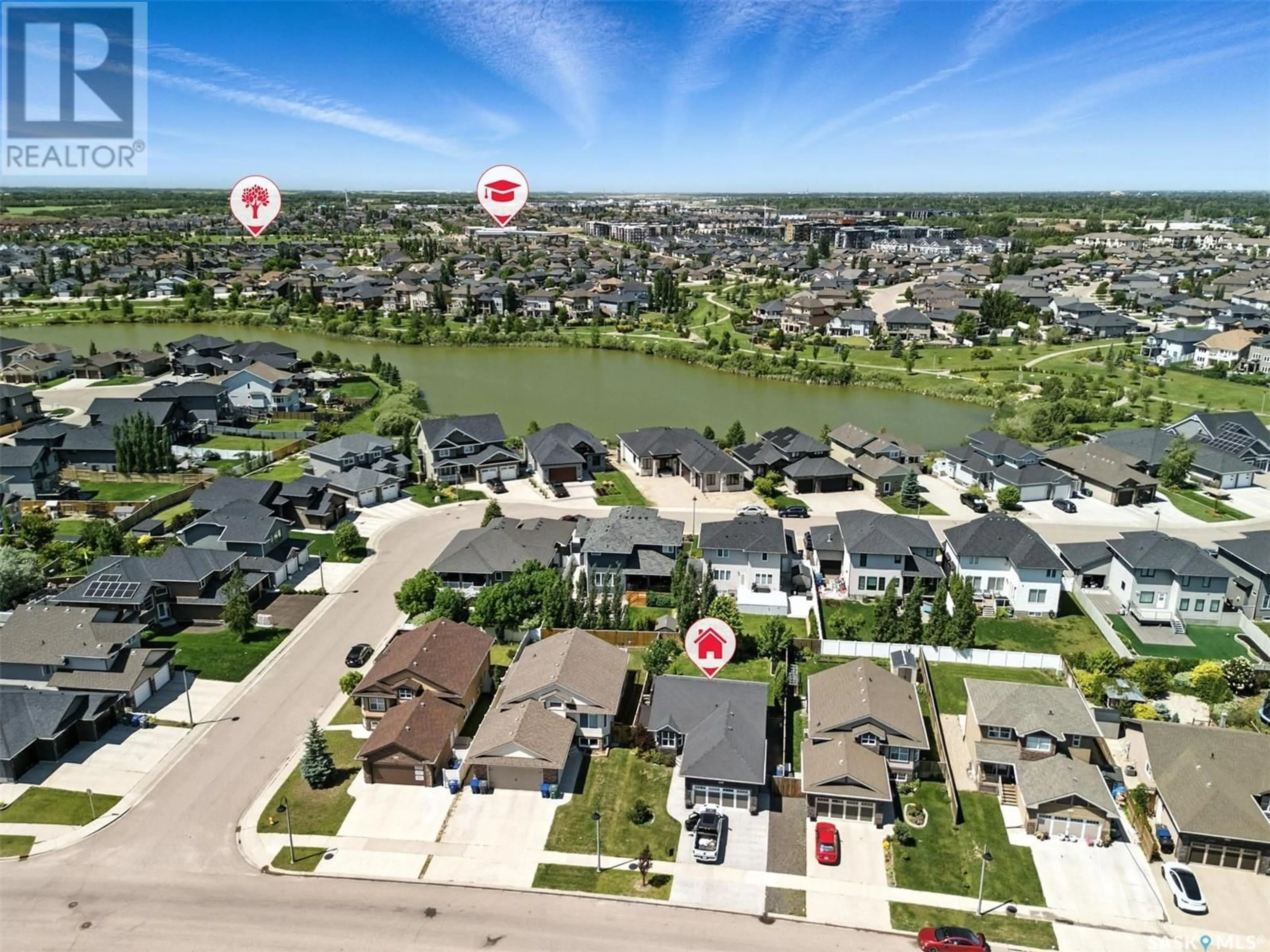 A pic from outside/outdoor area/front of a property/back of a property/a pic from drone, water/lake/river/ocean view for 930 HUNTER ROAD, Saskatoon Saskatchewan S7T0P8