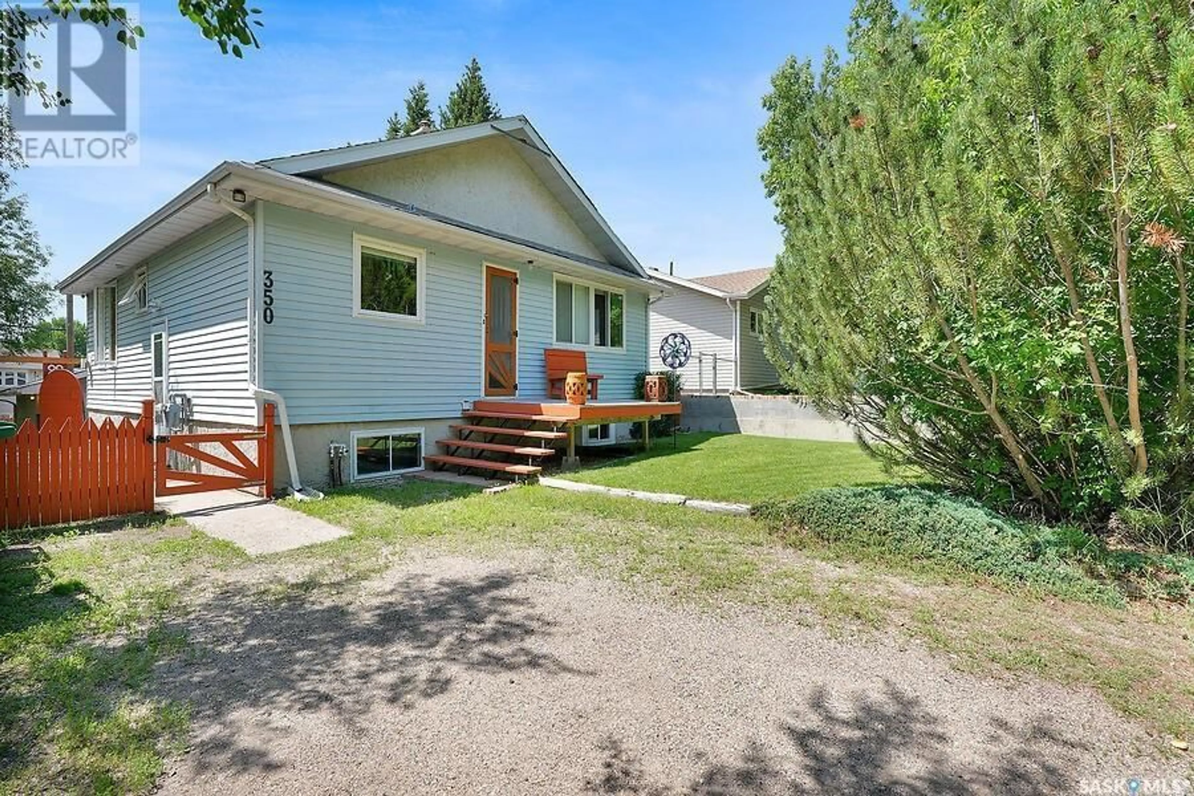 Home with vinyl exterior material, street for 350 3RD STREET, Pilot Butte Saskatchewan S0G3Z0