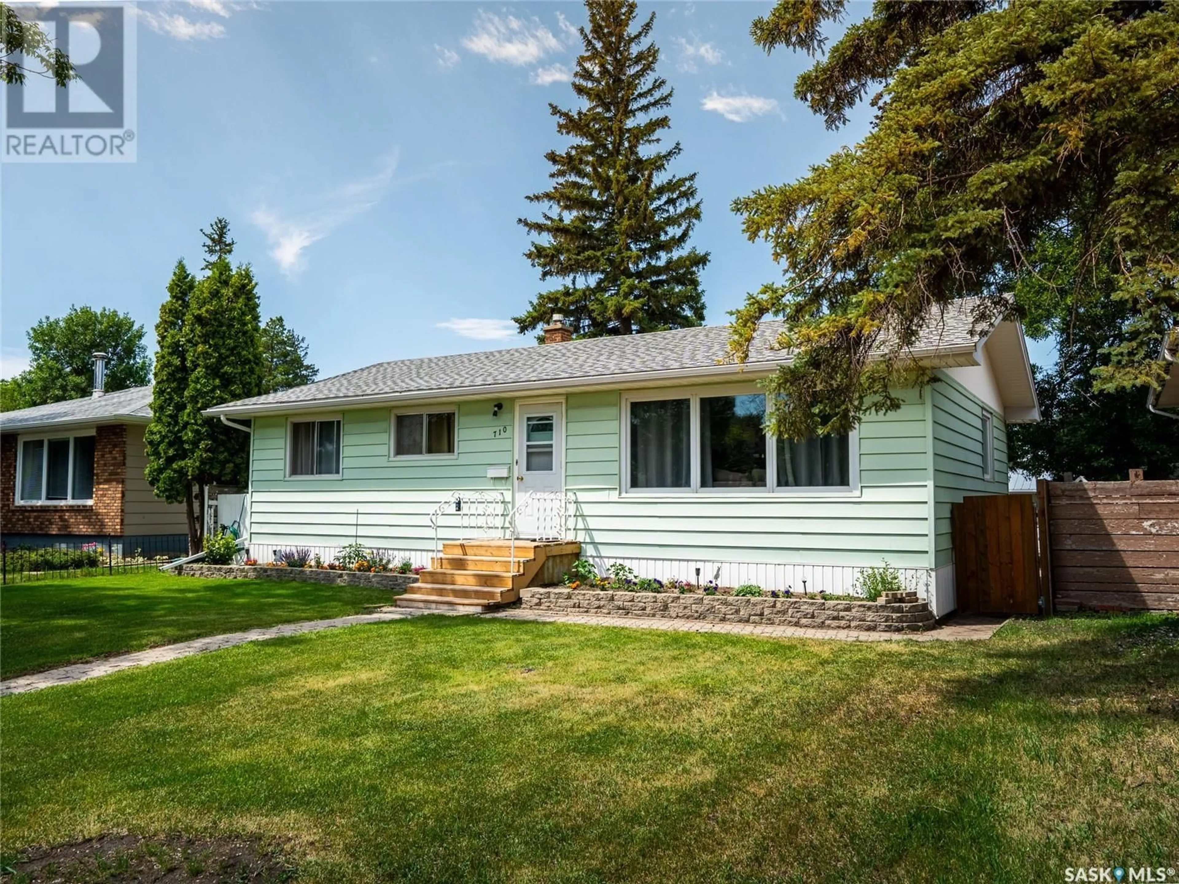 Home with vinyl exterior material, street for 710 FORGET STREET, Regina Saskatchewan S4T4X2