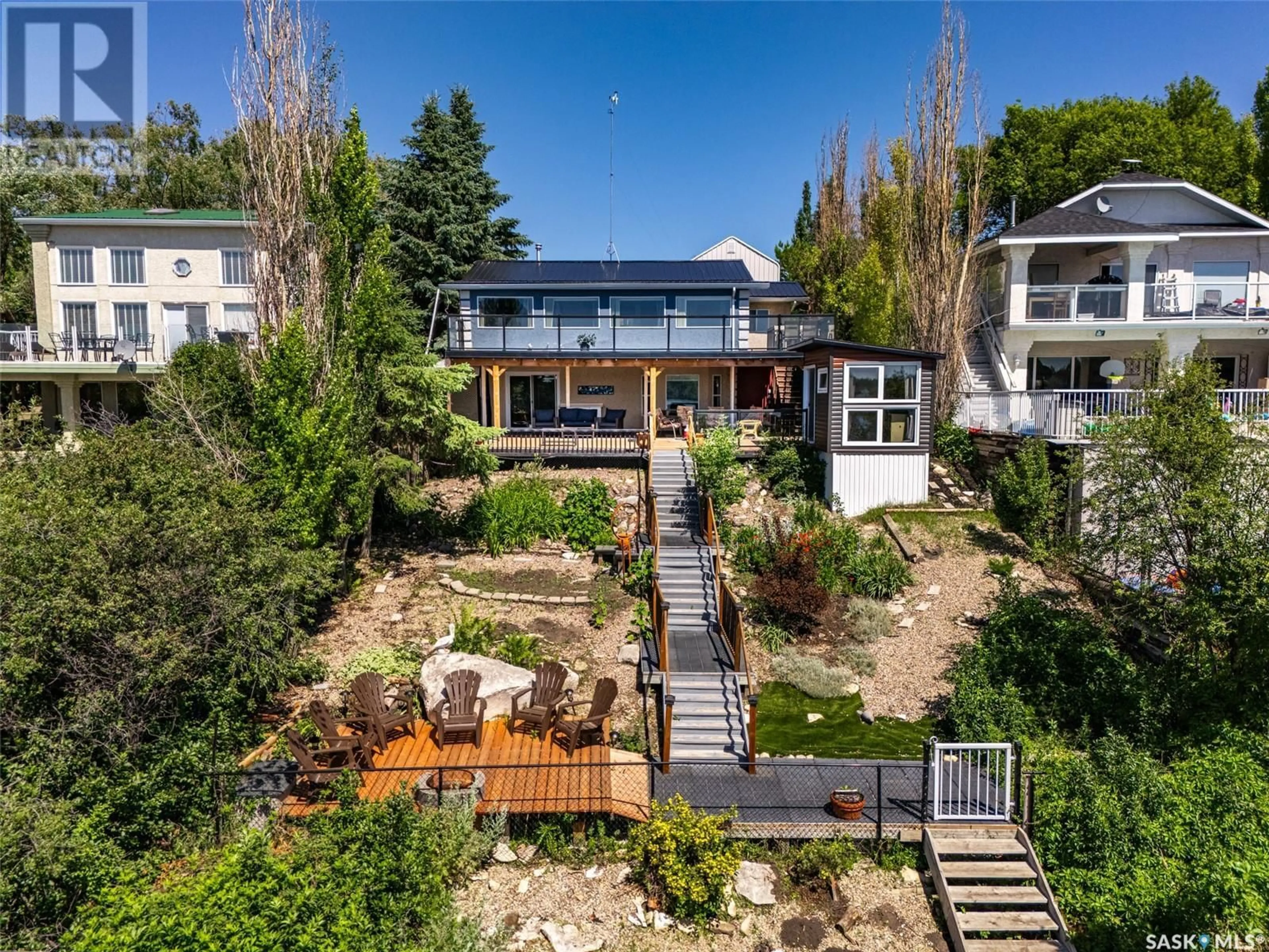 A pic from outside/outdoor area/front of a property/back of a property/a pic from drone, street for 5703 NELSON BEACH DR, Hoodoo Rm No. 401 Saskatchewan S0K4P0