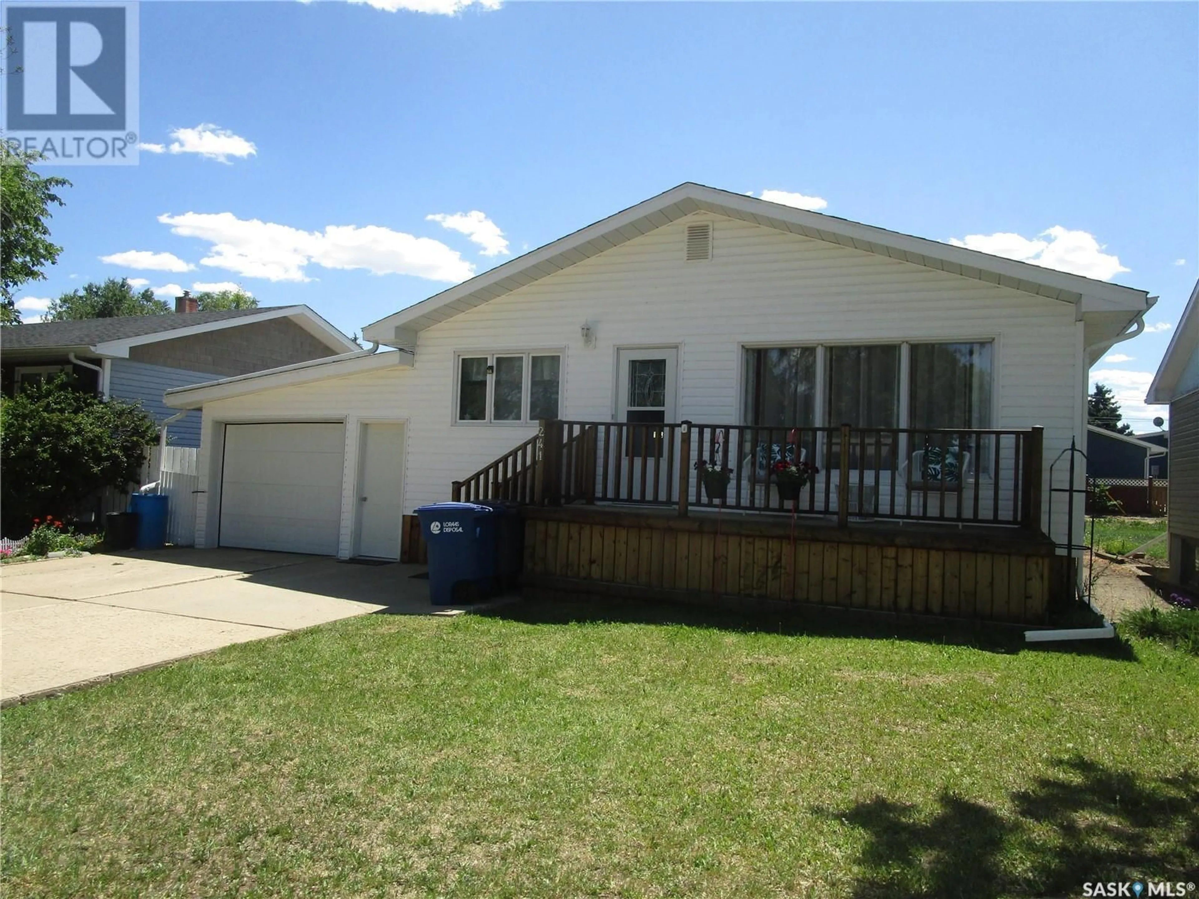 Home with vinyl exterior material, street for 241 DOMINION ROAD, Assiniboia Saskatchewan S0H0B0