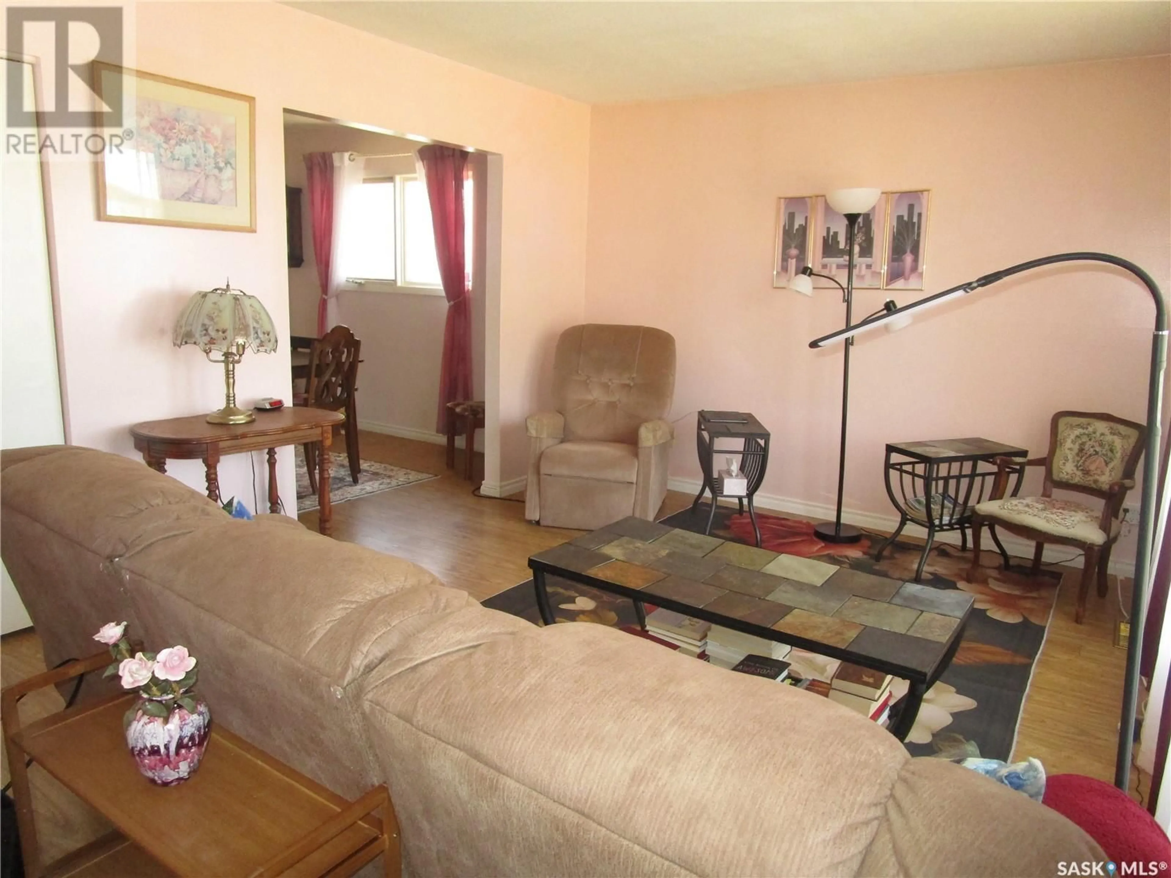 Living room with furniture, unknown for 241 DOMINION ROAD, Assiniboia Saskatchewan S0H0B0