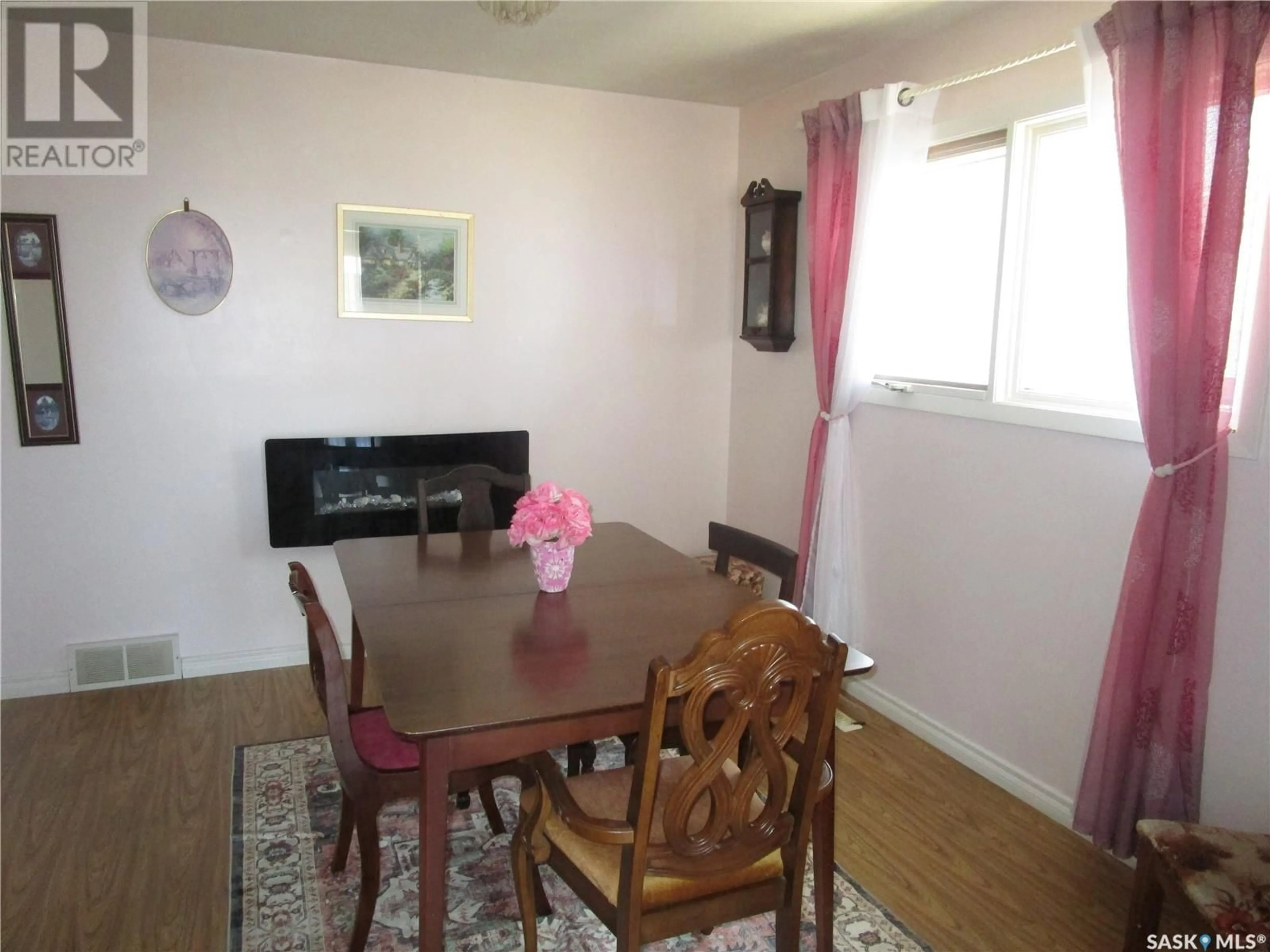 Dining room, wood/laminate floor for 241 DOMINION ROAD, Assiniboia Saskatchewan S0H0B0
