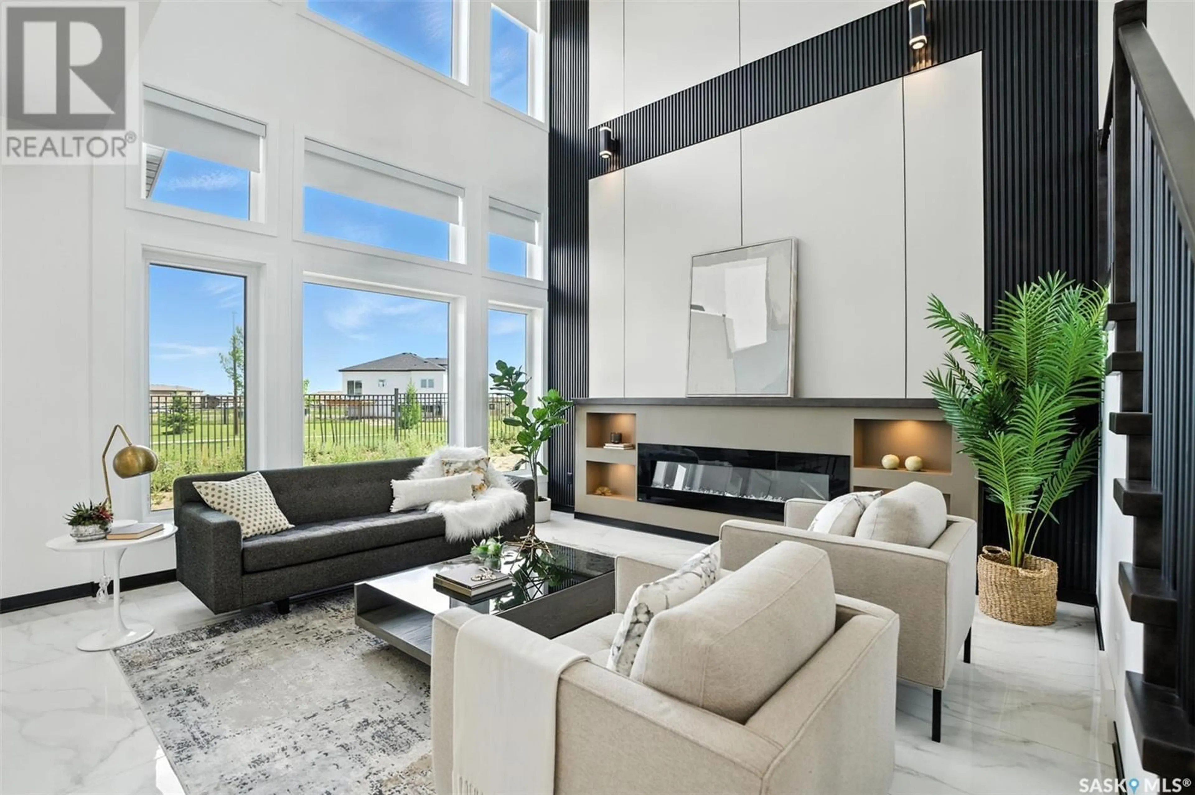 Living room with furniture, unknown for 319 WOOLF BAY, Saskatoon Saskatchewan S7W1E5