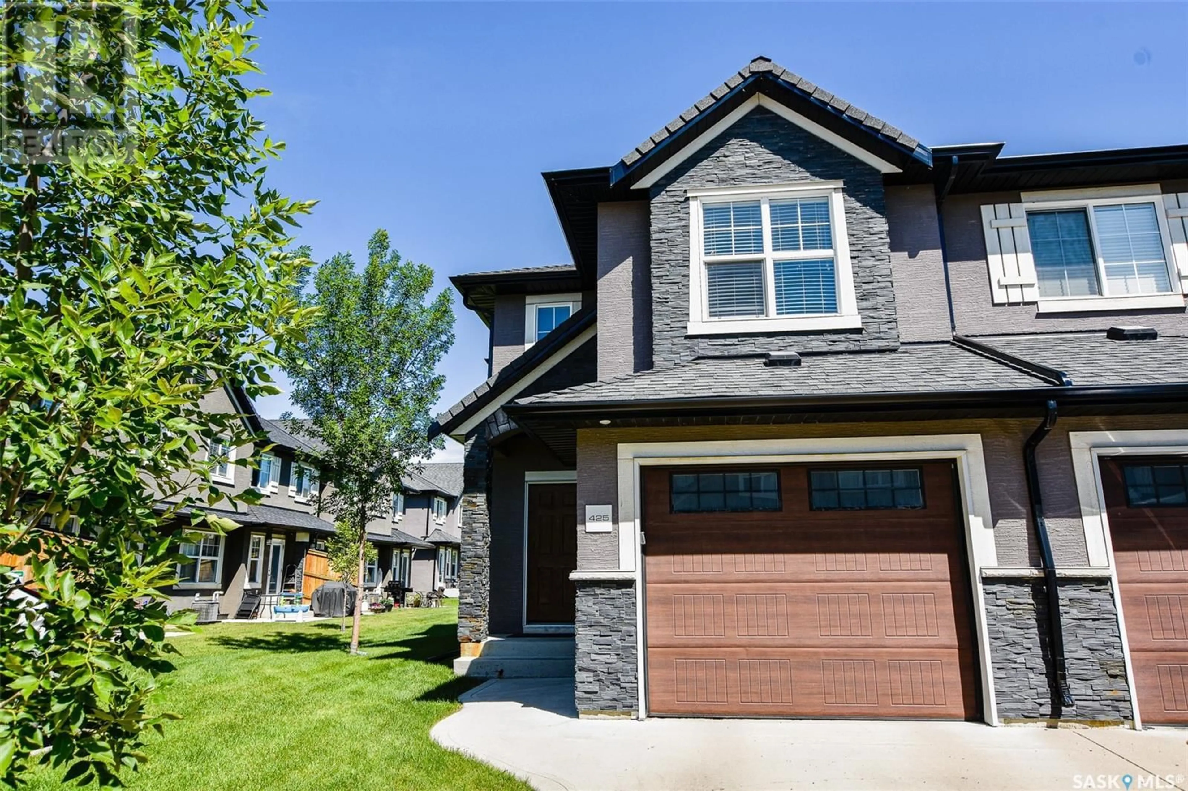 Home with brick exterior material, street for 1303 - 425 PATON CRESCENT, Saskatoon Saskatchewan S7W0P7