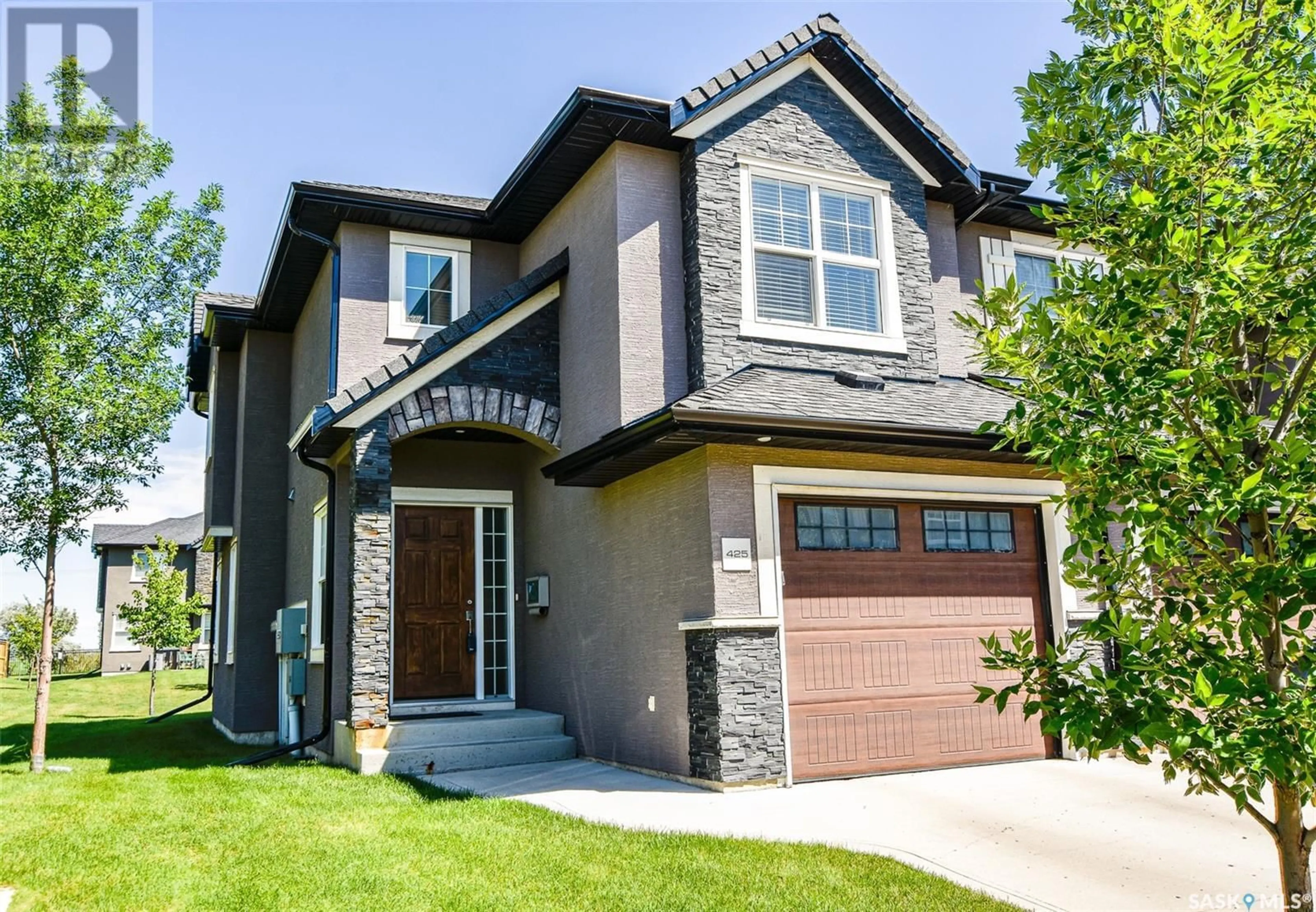 Home with brick exterior material, street for 1303 - 425 PATON CRESCENT, Saskatoon Saskatchewan S7W0P7
