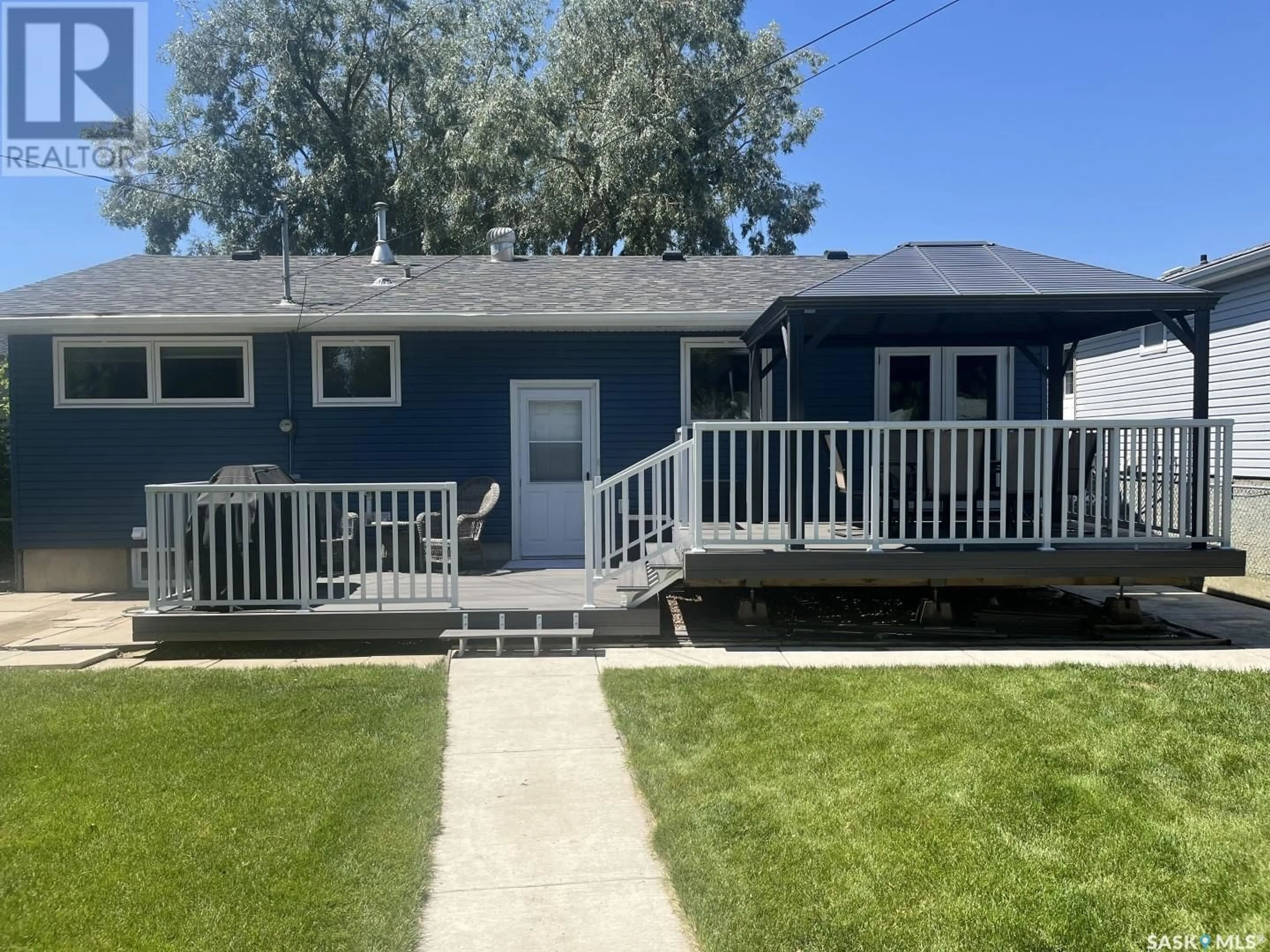 Home with vinyl exterior material, street for 2117 STE CECILIA AVENUE, Saskatoon Saskatchewan S7M0P3