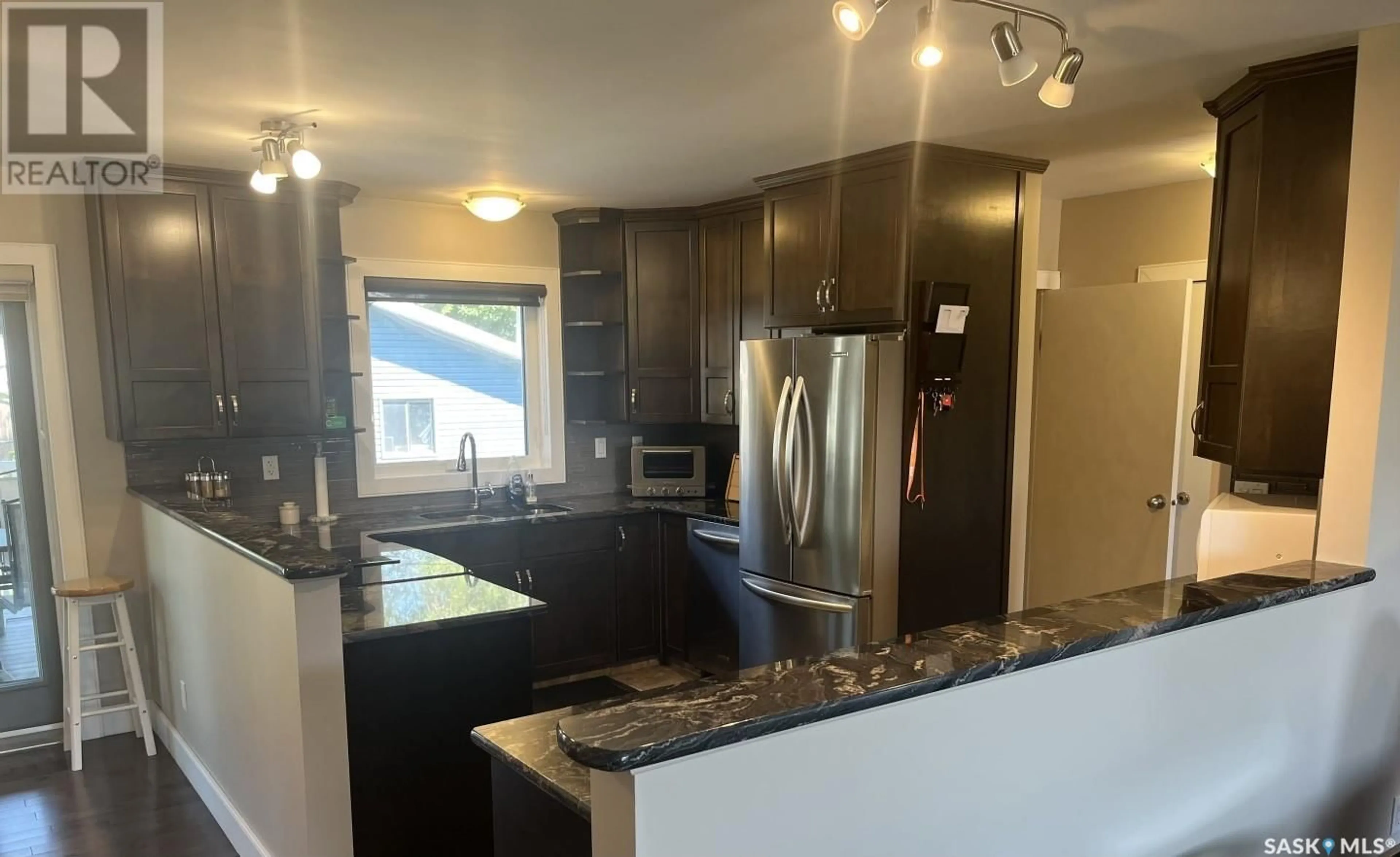 Open concept kitchen, unknown for 2117 STE CECILIA AVENUE, Saskatoon Saskatchewan S7M0P3