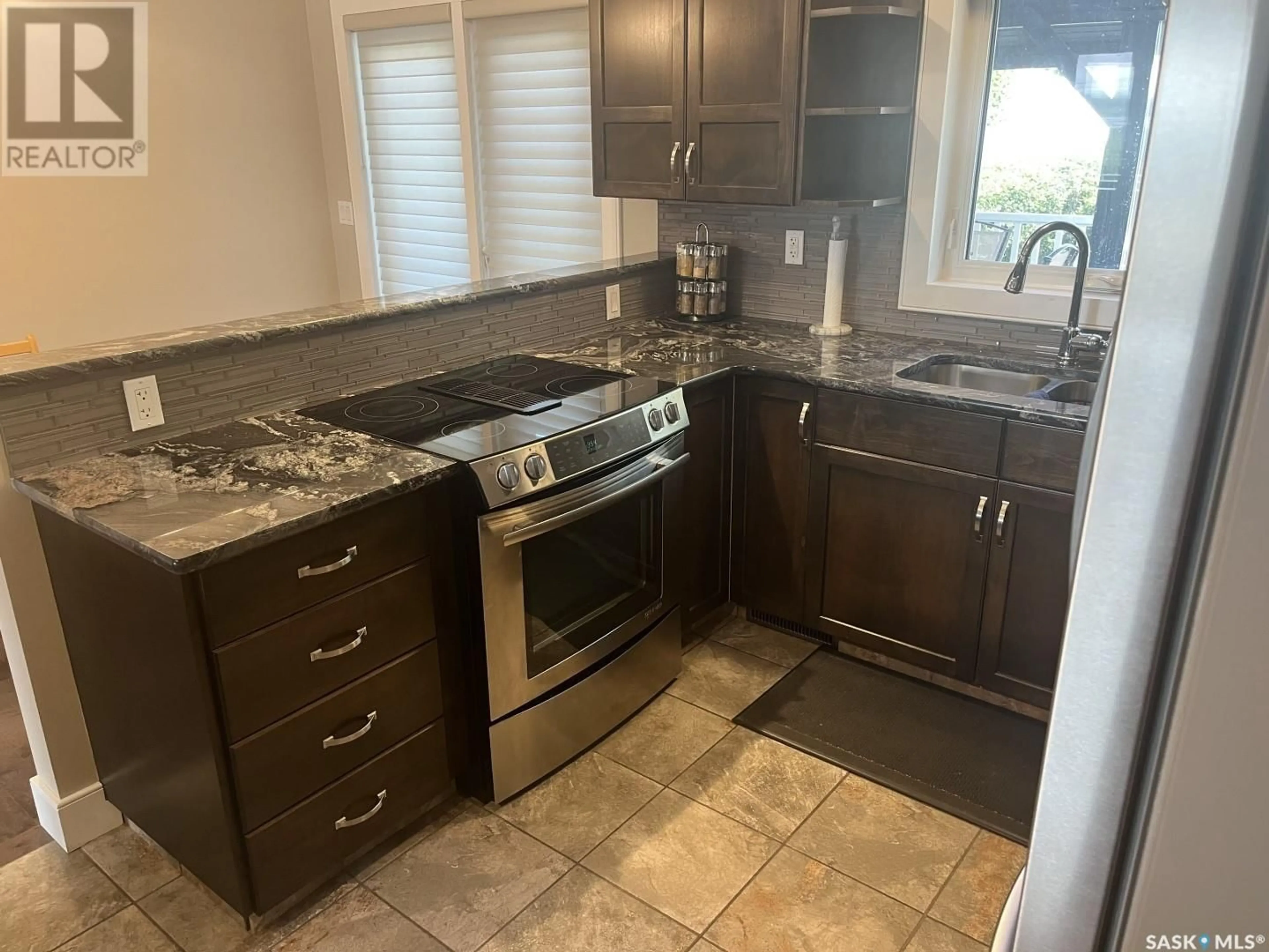 Standard kitchen, ceramic/tile floor for 2117 STE CECILIA AVENUE, Saskatoon Saskatchewan S7M0P3