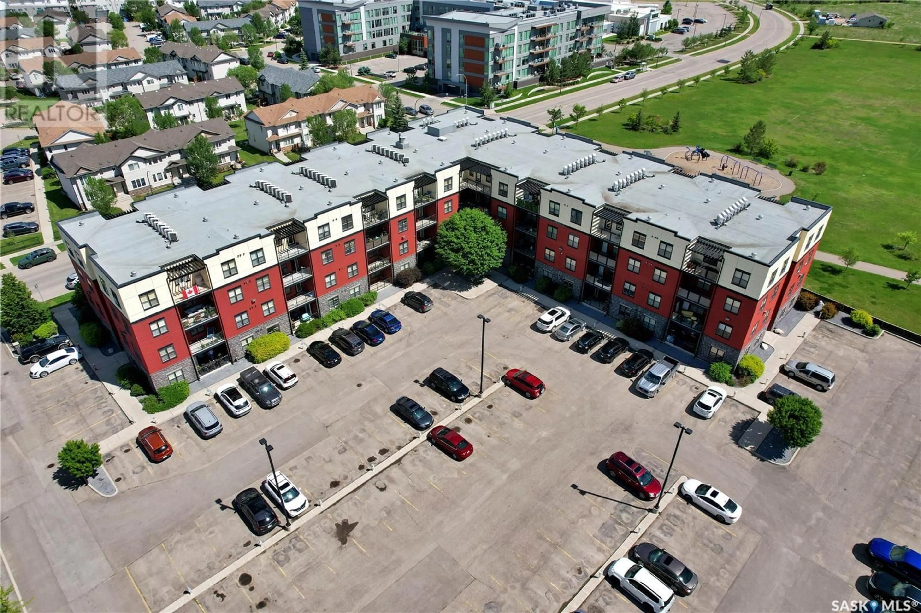 A pic from outside/outdoor area/front of a property/back of a property/a pic from drone, unknown for 230 - 303 SLIMMON ROAD, Saskatoon Saskatchewan S7V0B3