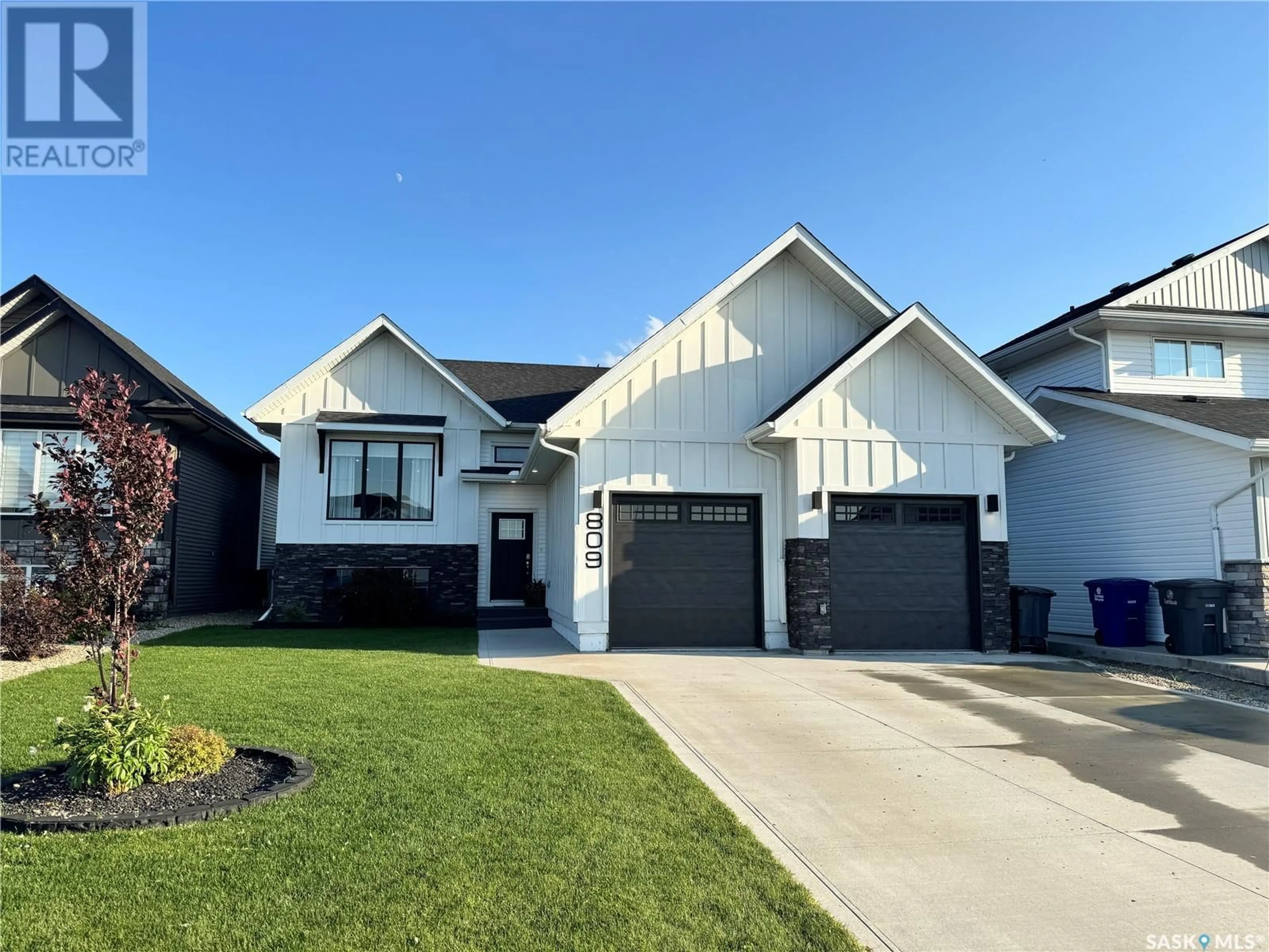 Home with brick exterior material, street for 809 WEIR CRESCENT, Warman Saskatchewan S0K4S4