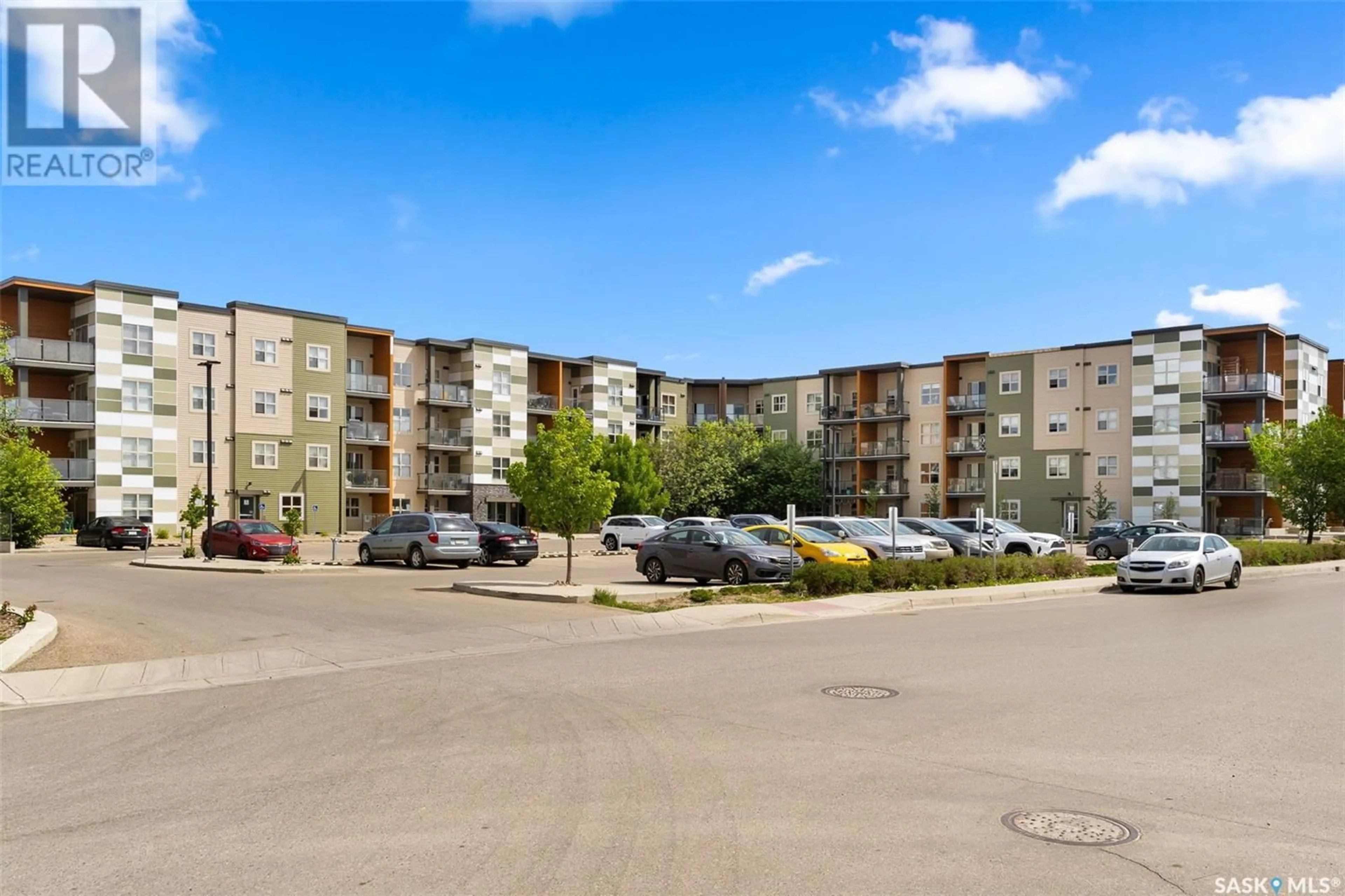 A pic from outside/outdoor area/front of a property/back of a property/a pic from drone, unknown for 5500 - 1101 MITCHINSON WAY, Regina Saskatchewan S4W0N9
