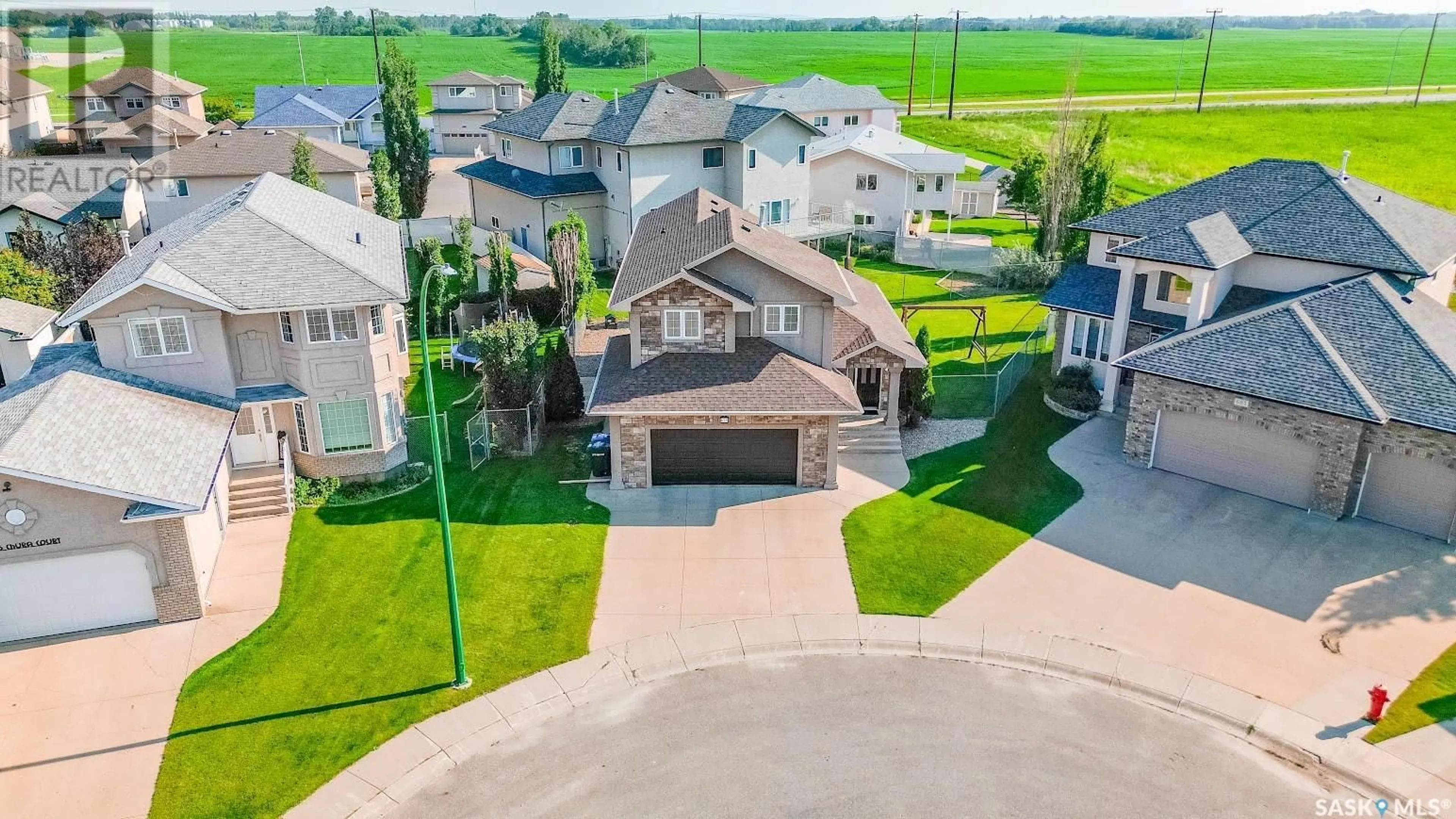 A pic from outside/outdoor area/front of a property/back of a property/a pic from drone, street for 675 CHURA COURT, Prince Albert Saskatchewan S6V8E4