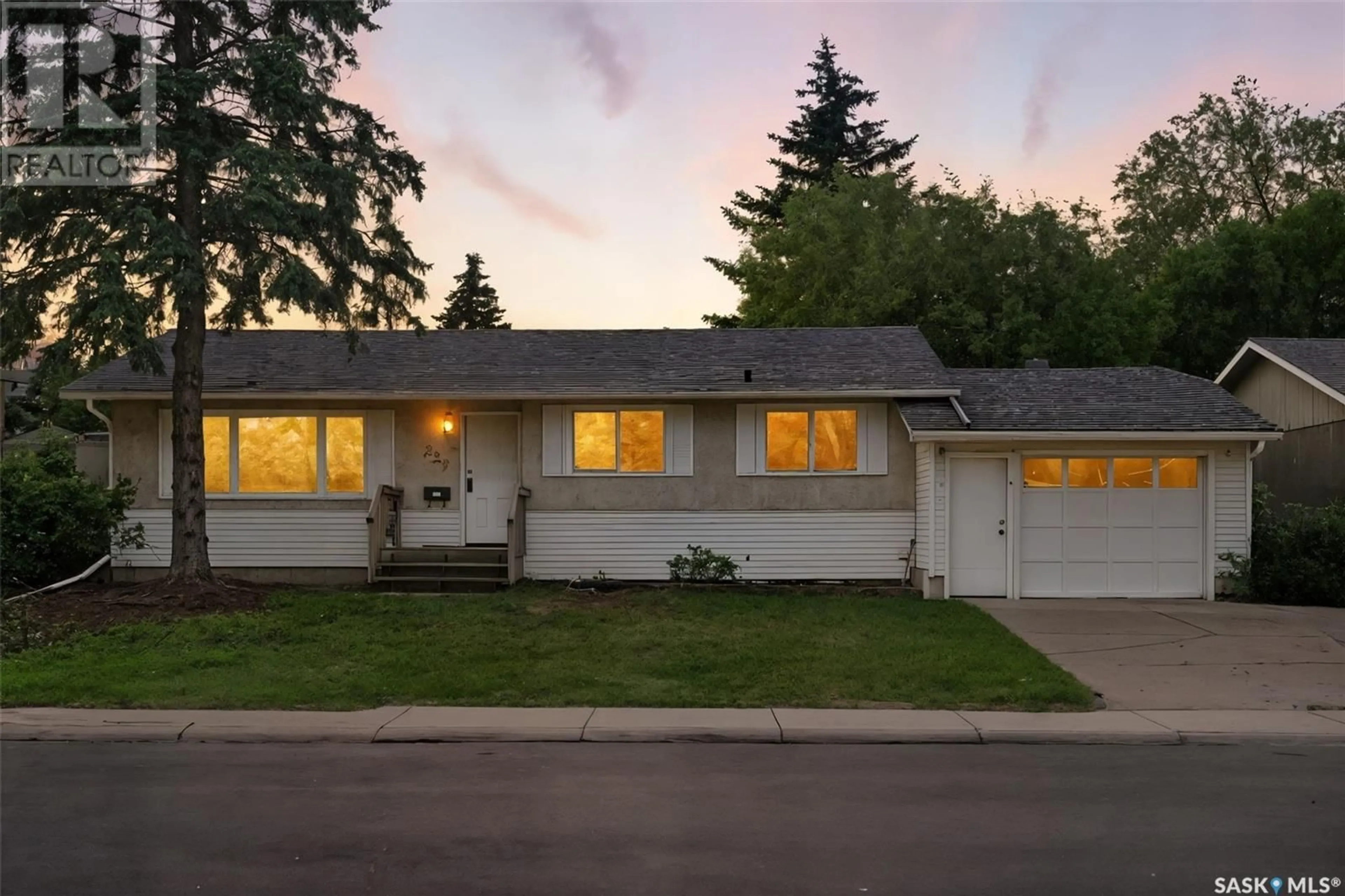 Home with vinyl exterior material, street for 229 CARLETON DRIVE, Saskatoon Saskatchewan S7H3P1