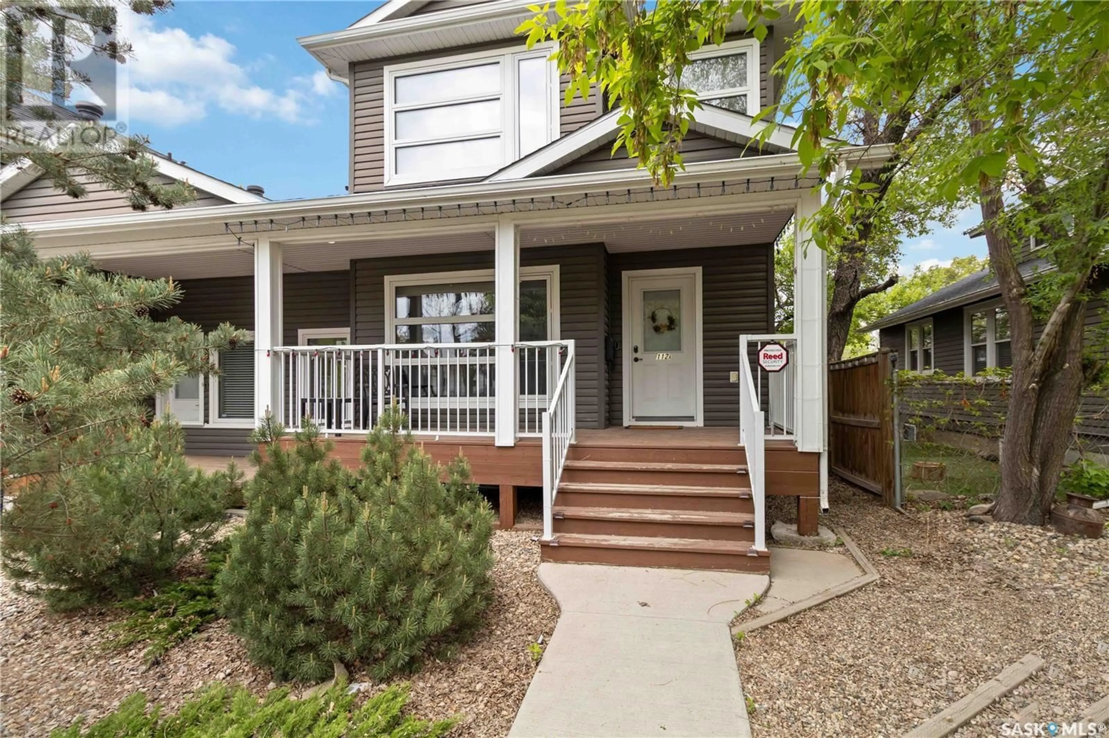 Home with vinyl exterior material, street for 112A 109TH STREET, Saskatoon Saskatchewan S7N1R2