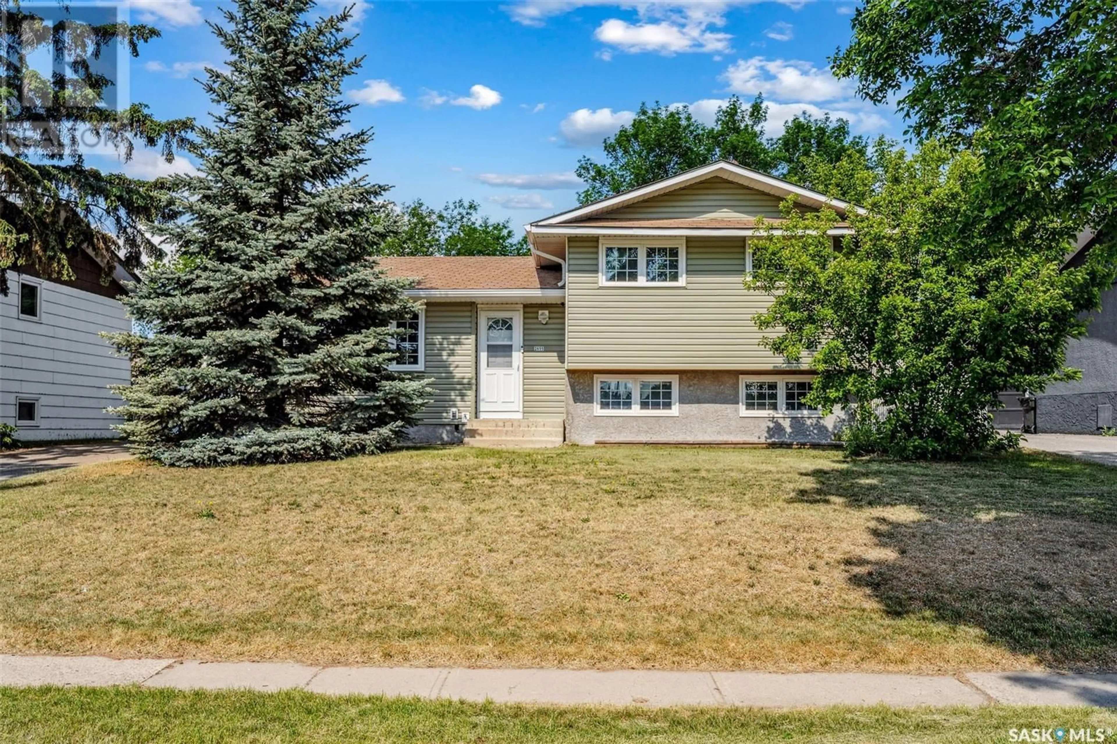 Home with vinyl exterior material, street for 2655 15TH AVENUE E, Prince Albert Saskatchewan S6V6H4