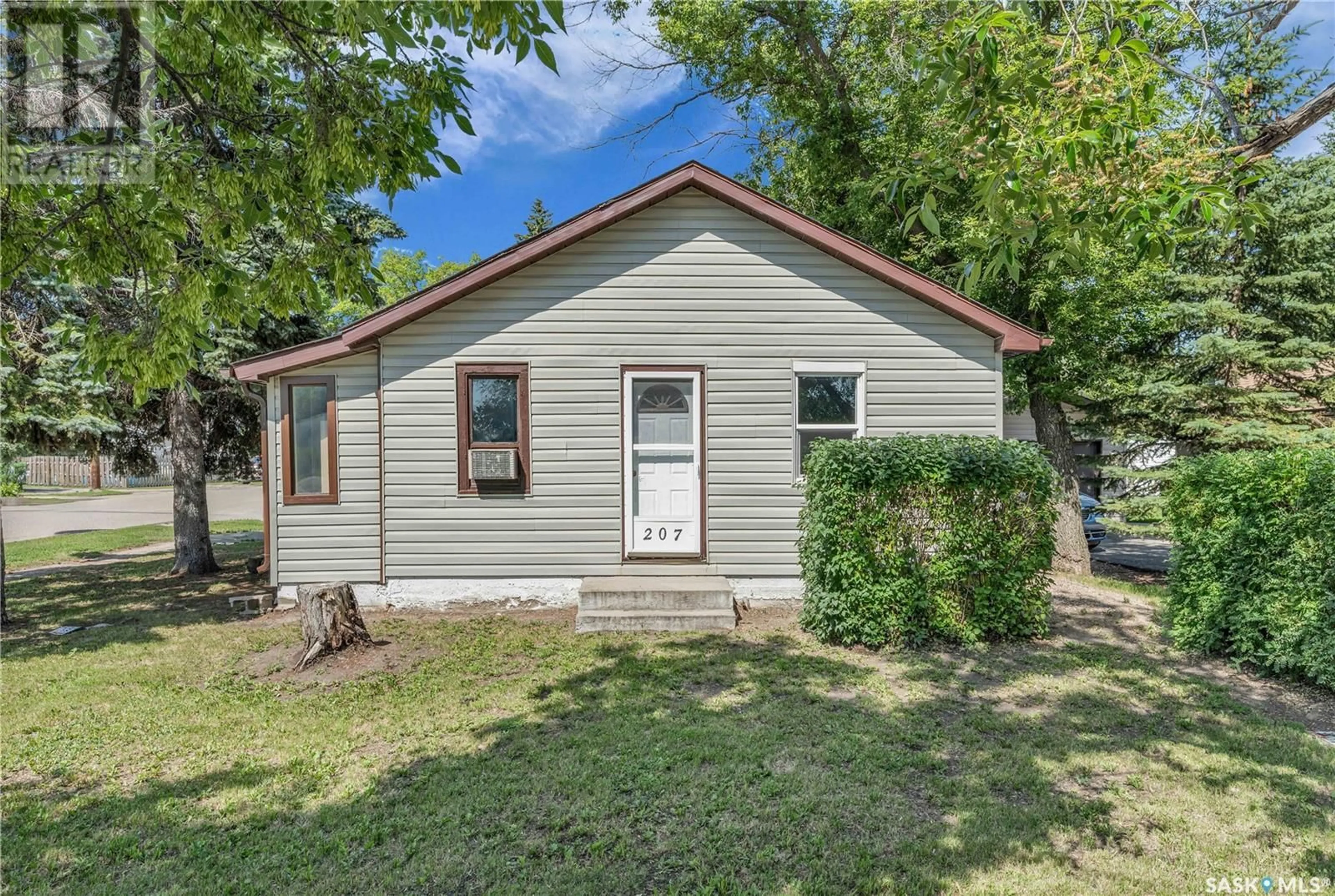 Home with vinyl exterior material, street for 207 3RD STREET, Dalmeny Saskatchewan S0K1E0