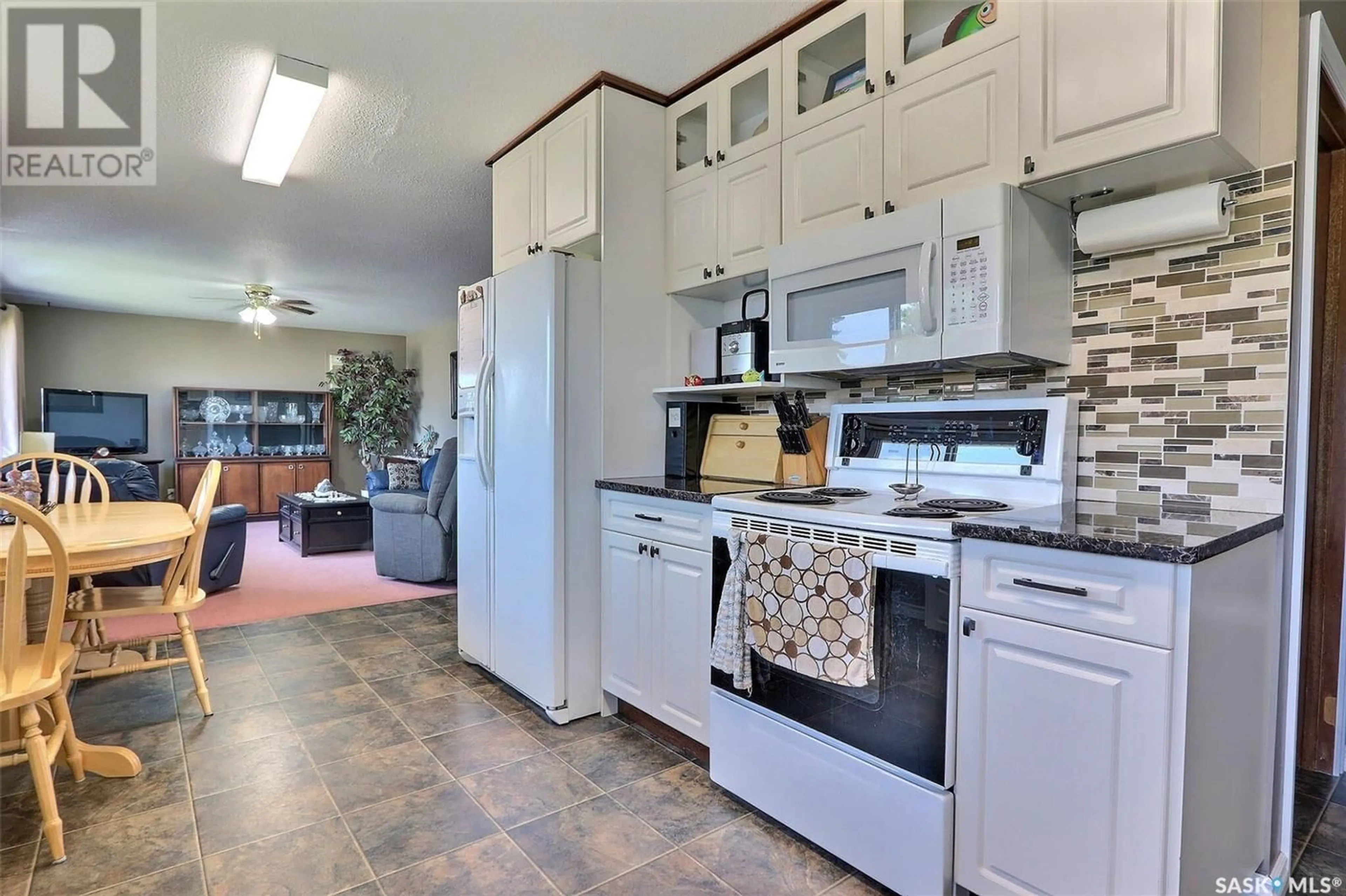 Open concept kitchen, ceramic/tile floor for 935 1ST STREET, Prince Albert Saskatchewan S6V0C5