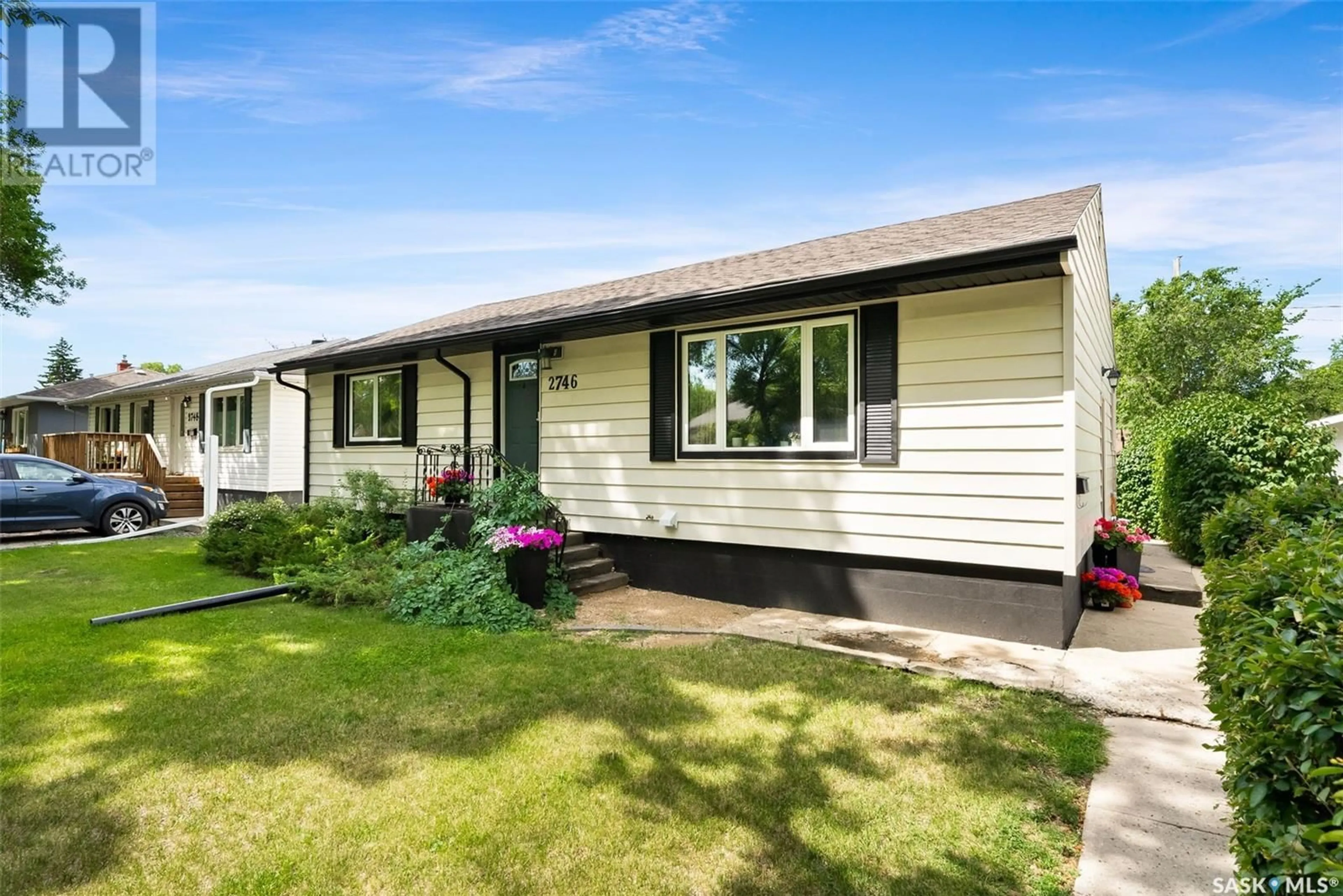 Home with vinyl exterior material, street for 2746 ABBOTT ROAD, Regina Saskatchewan S4N2J6