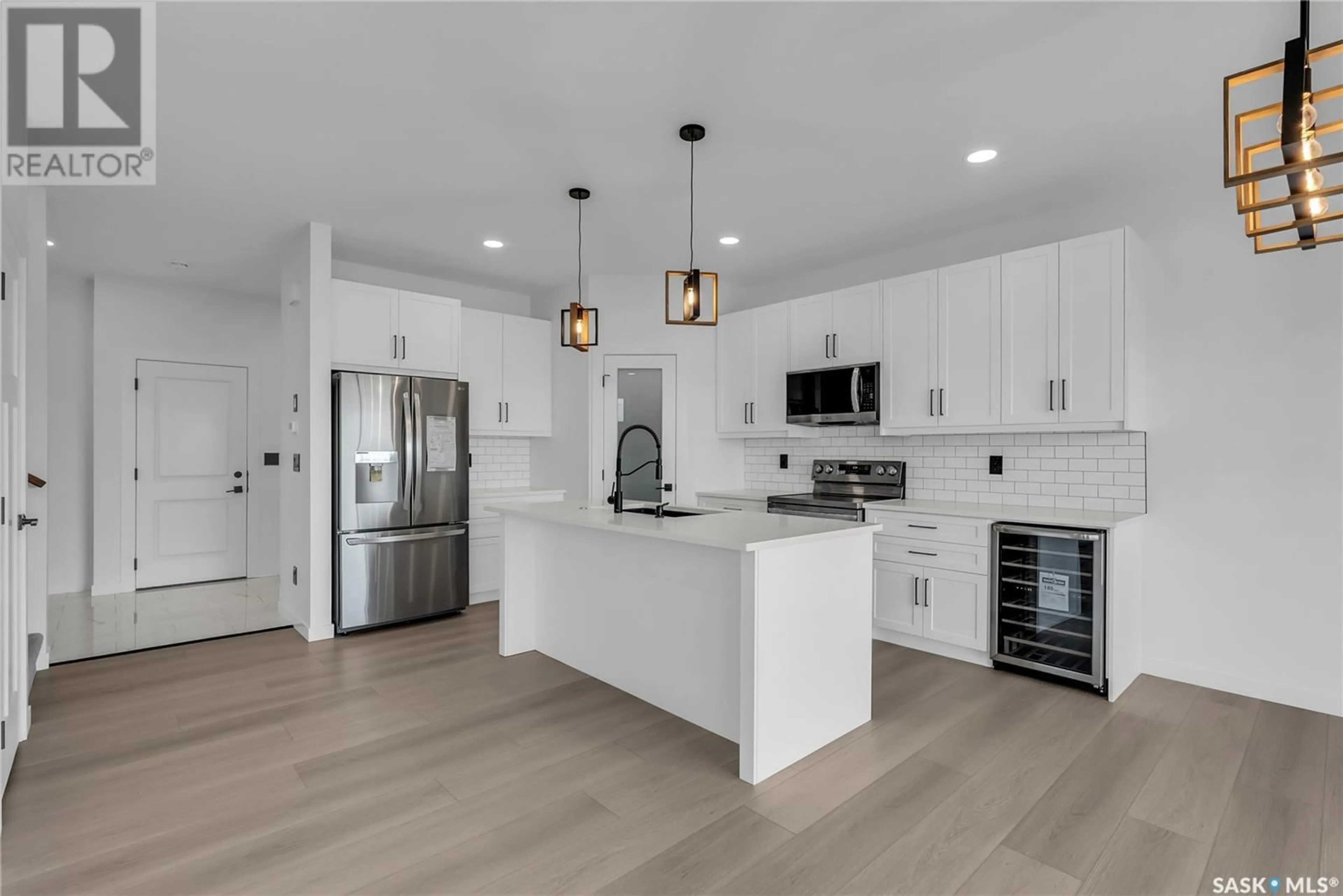 Open concept kitchen, unknown for 351 SHARMA CRESCENT, Saskatoon Saskatchewan S7W1K9