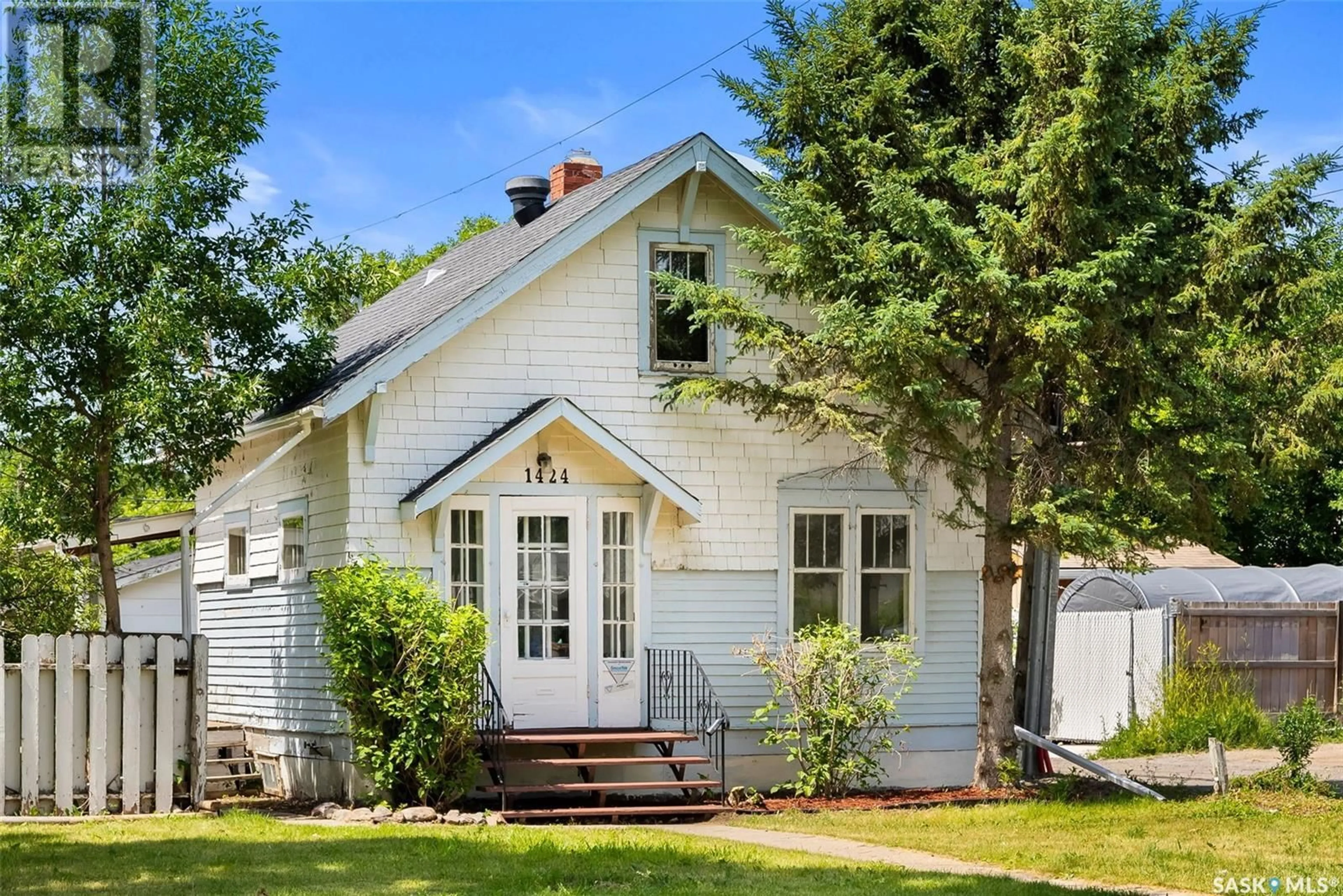 Home with vinyl exterior material, street for 1424 ROYAL STREET, Regina Saskatchewan S4T5A3