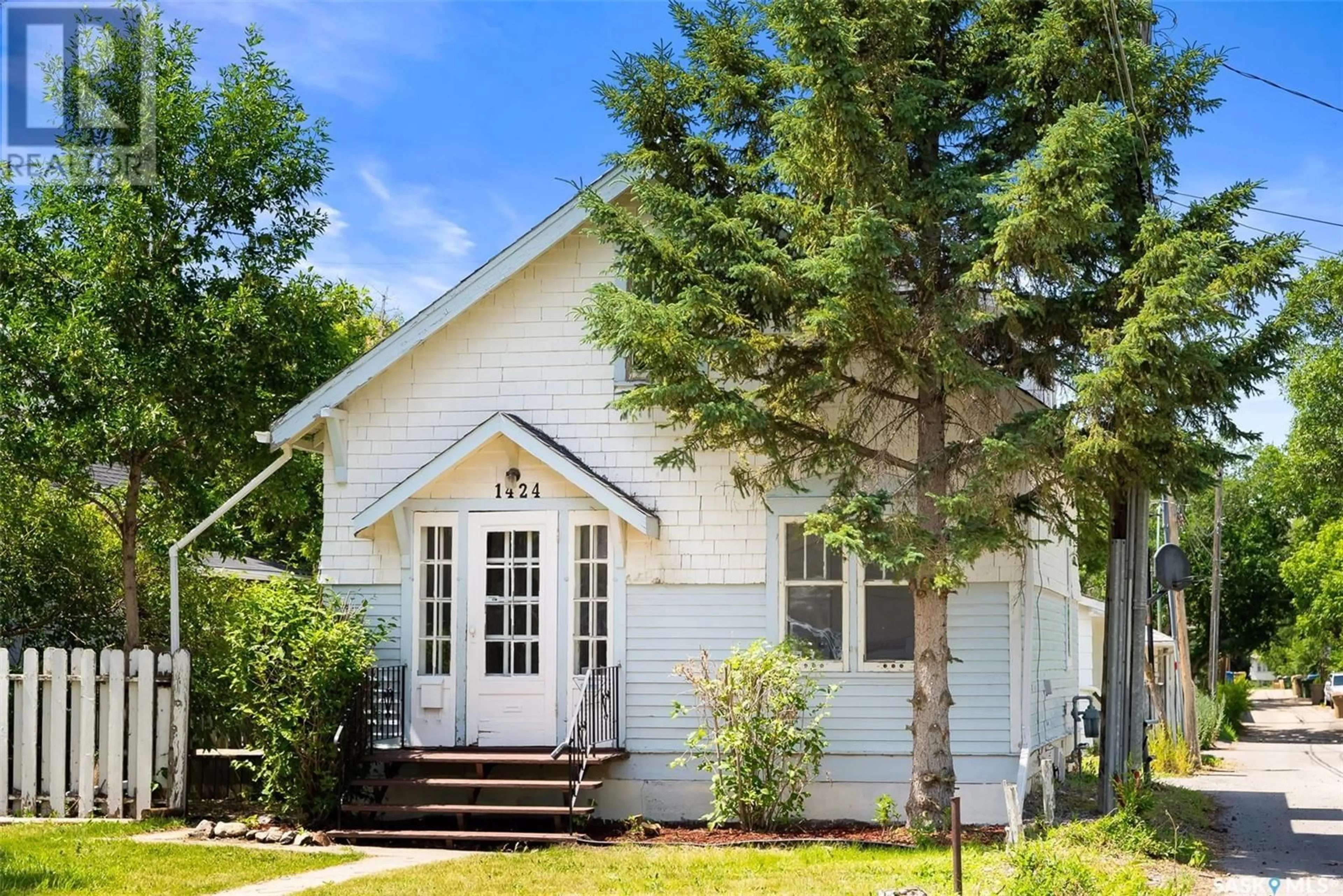 Home with vinyl exterior material, street for 1424 ROYAL STREET, Regina Saskatchewan S4T5A3