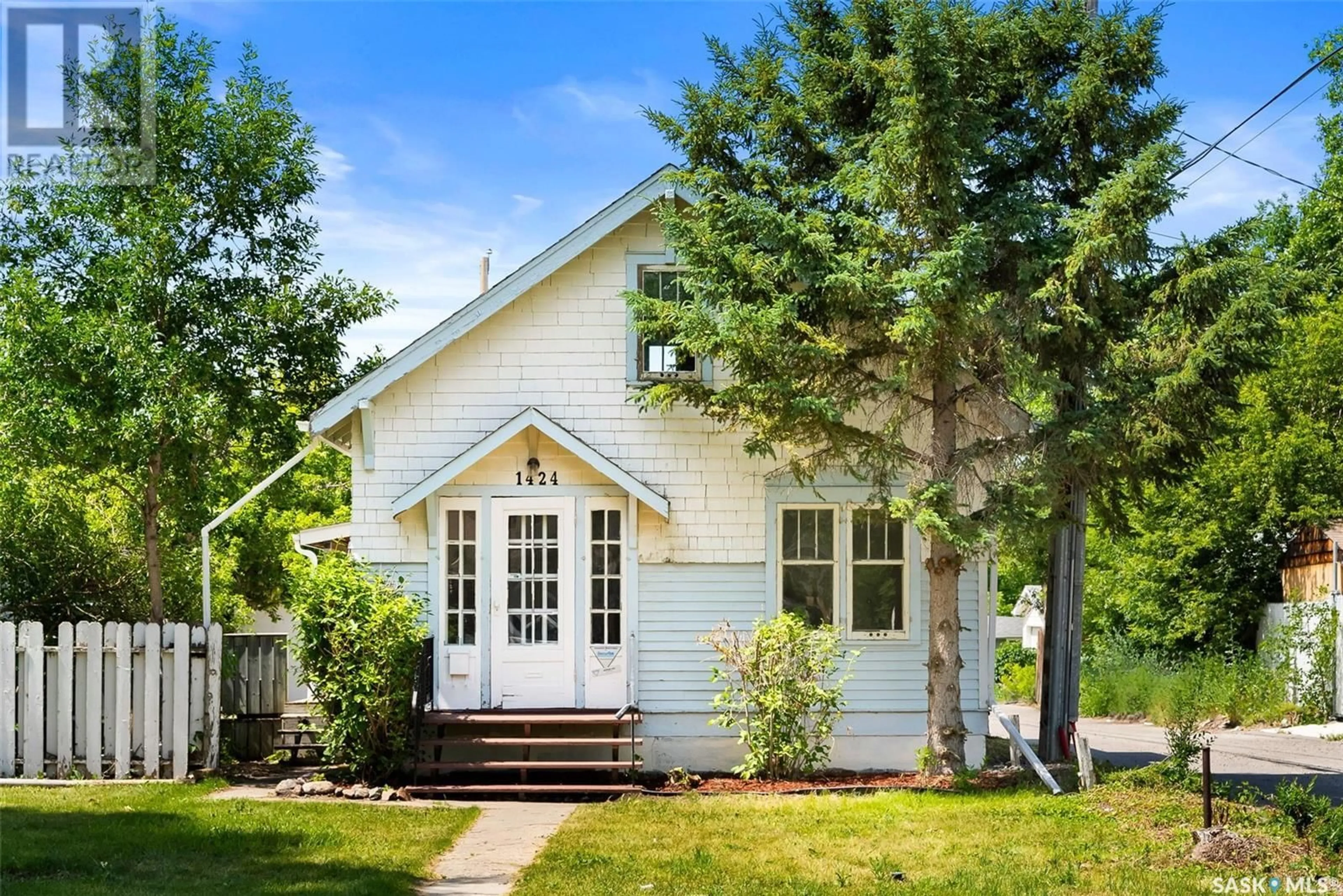 Home with vinyl exterior material, street for 1424 ROYAL STREET, Regina Saskatchewan S4T5A3