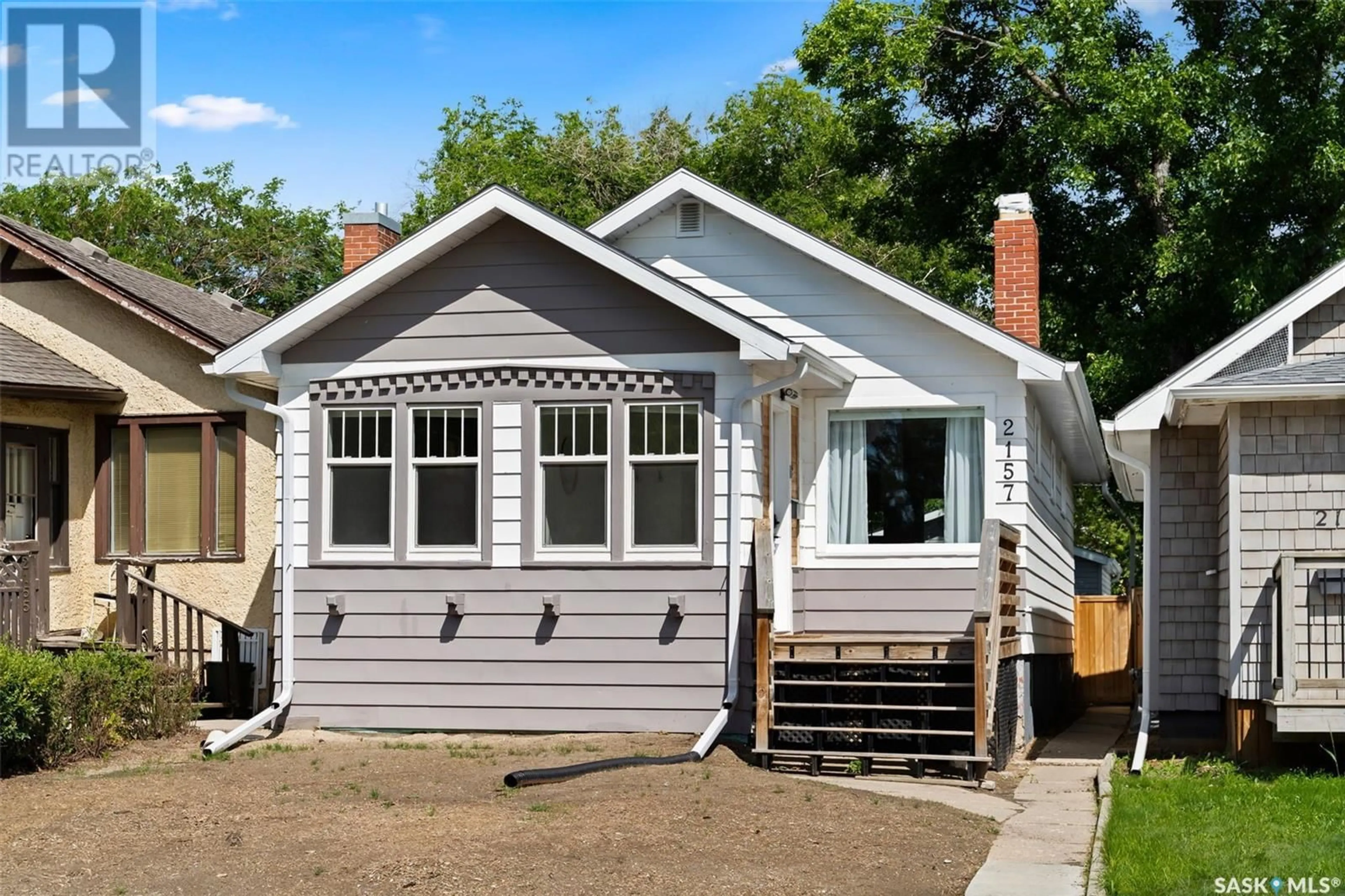 Home with vinyl exterior material, street for 2157 PRINCESS STREET, Regina Saskatchewan S4T3Z7