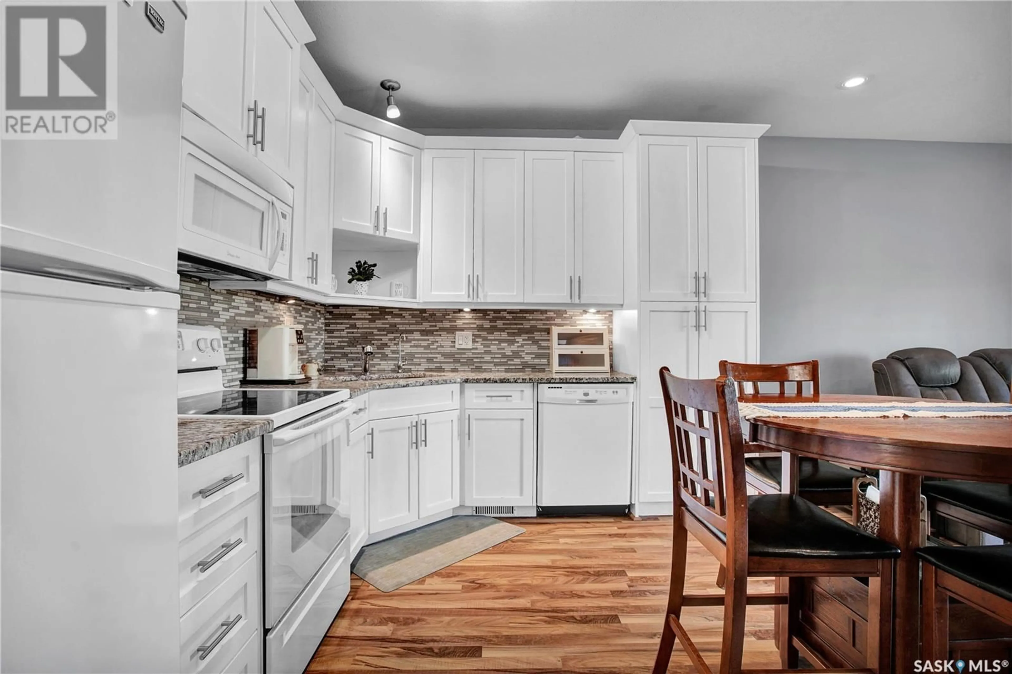 Open concept kitchen, ceramic/tile floor for 215 - 14 HAMPTON GREEN, Saskatoon Saskatchewan S7R0G7