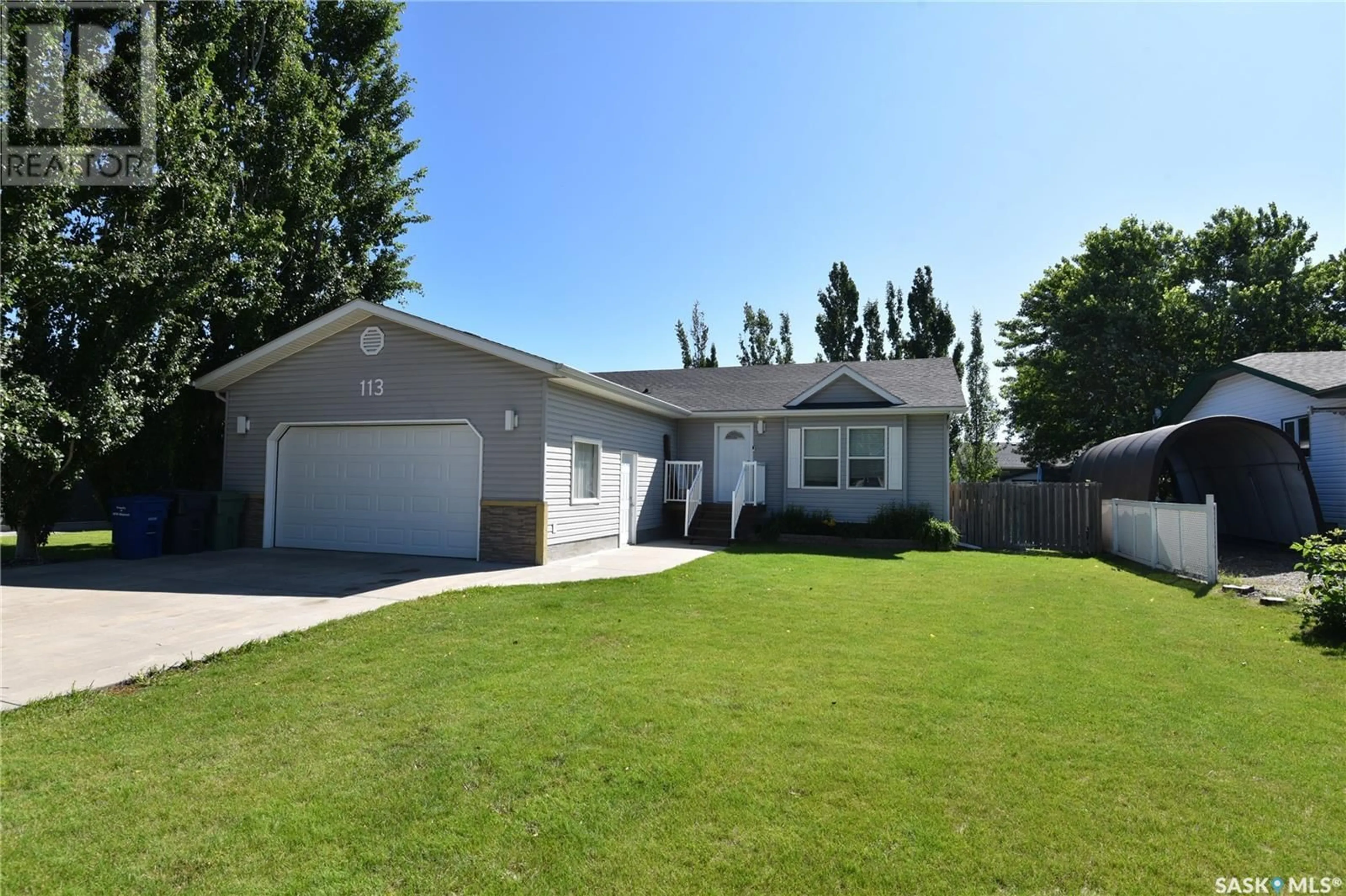 Home with vinyl exterior material, street for 113 6TH STREET, Nipawin Saskatchewan S0E1E0