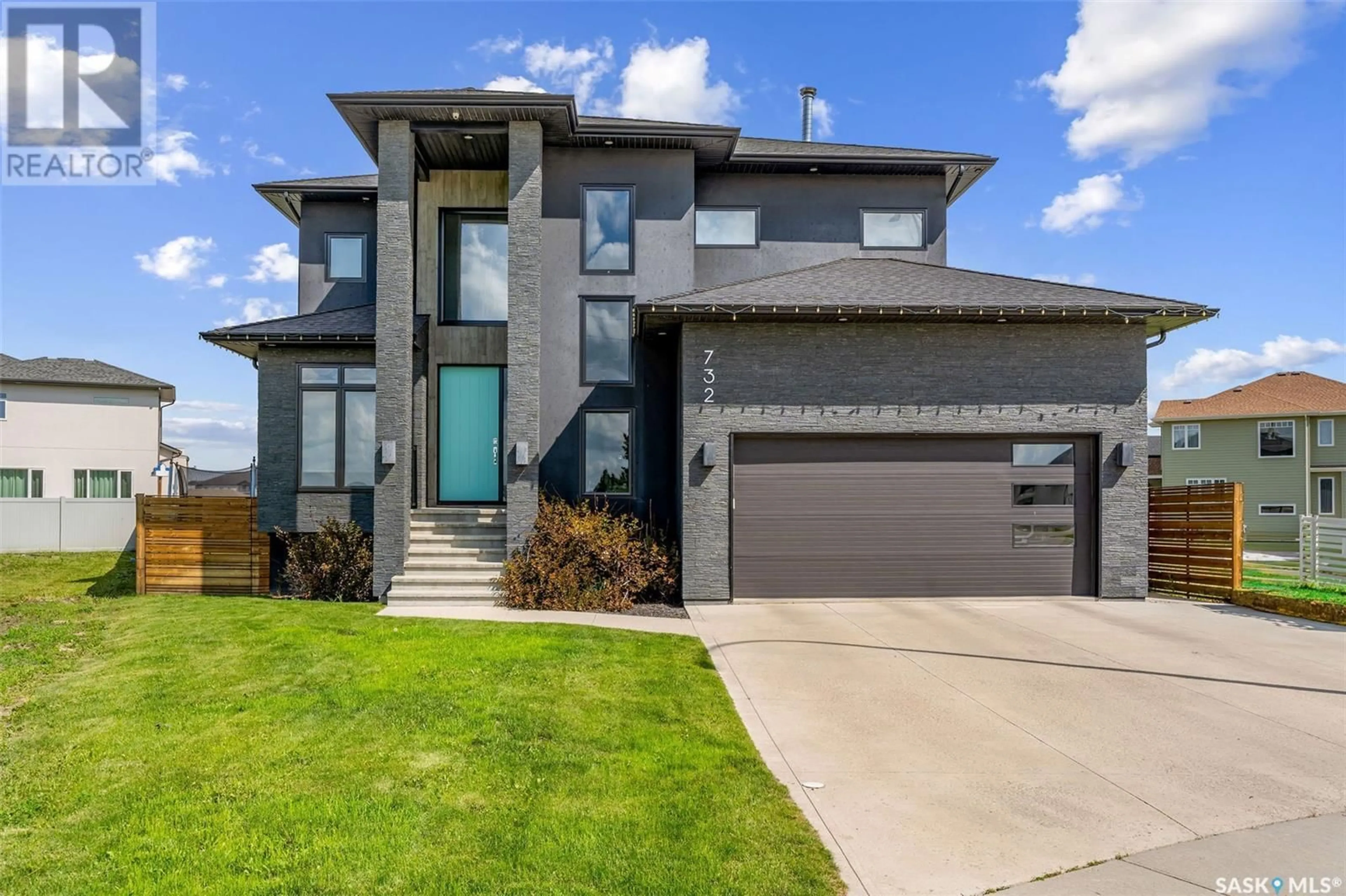 Home with vinyl exterior material, street for 732 32ND STREET, Prince Albert Saskatchewan S6V7H7