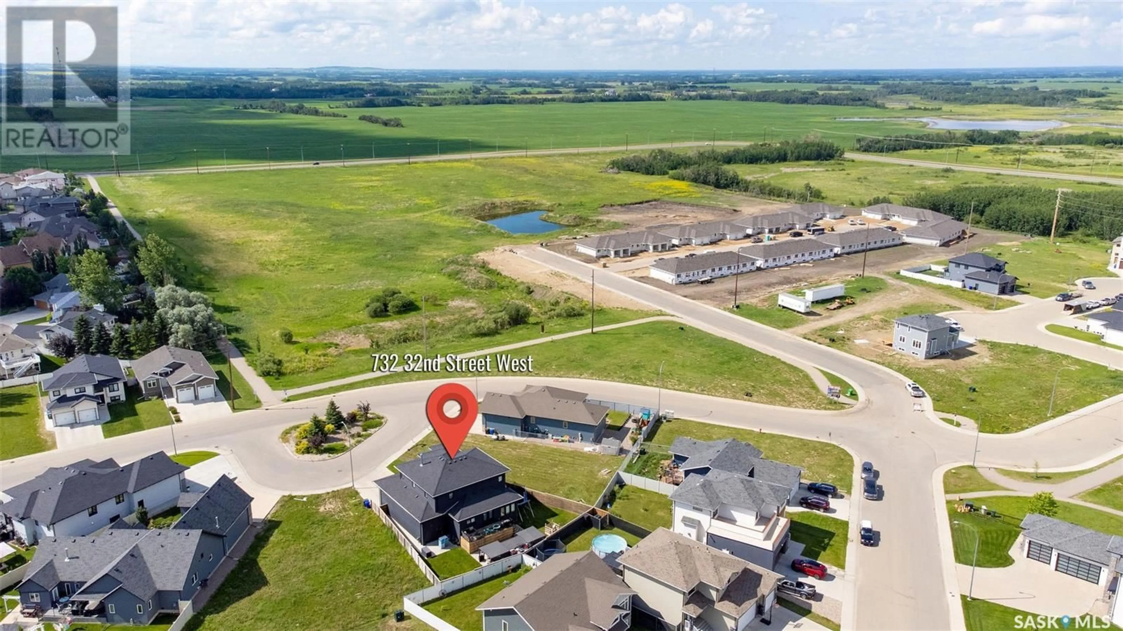 A pic from outside/outdoor area/front of a property/back of a property/a pic from drone, water/lake/river/ocean view for 732 32ND STREET, Prince Albert Saskatchewan S6V7H7
