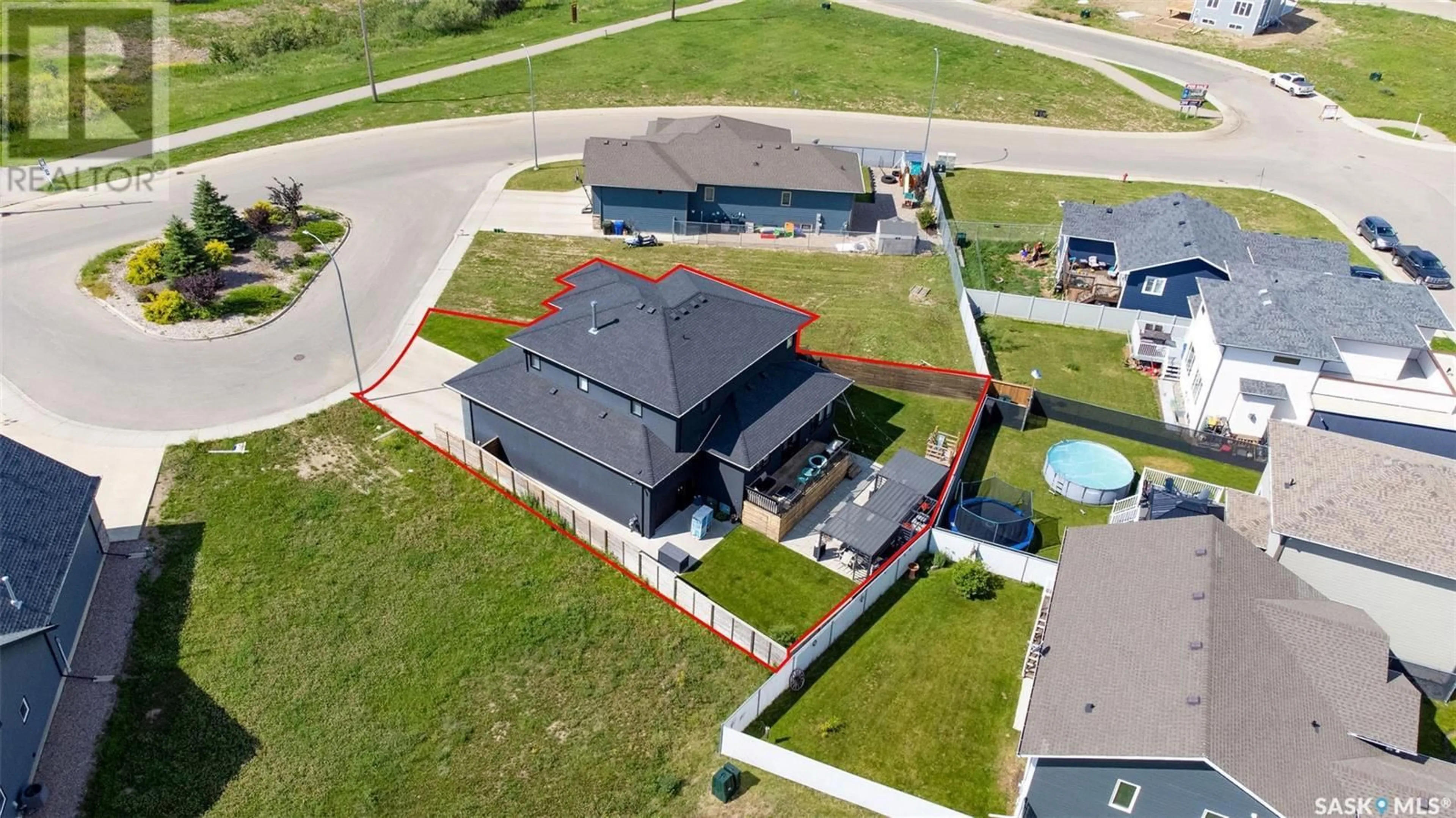 A pic from outside/outdoor area/front of a property/back of a property/a pic from drone, building for 732 32ND STREET, Prince Albert Saskatchewan S6V7H7