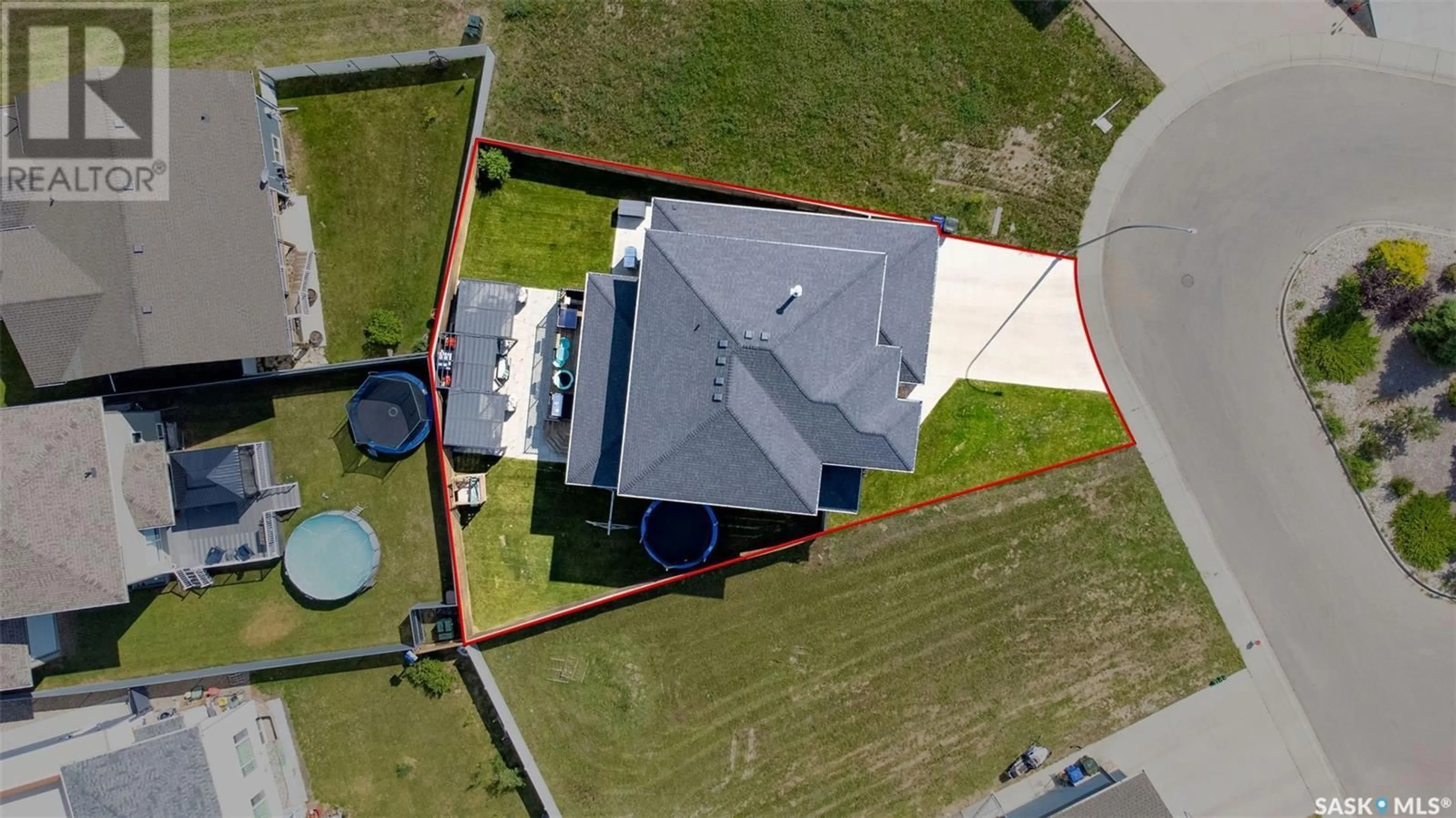 A pic from outside/outdoor area/front of a property/back of a property/a pic from drone, building for 732 32ND STREET, Prince Albert Saskatchewan S6V7H7
