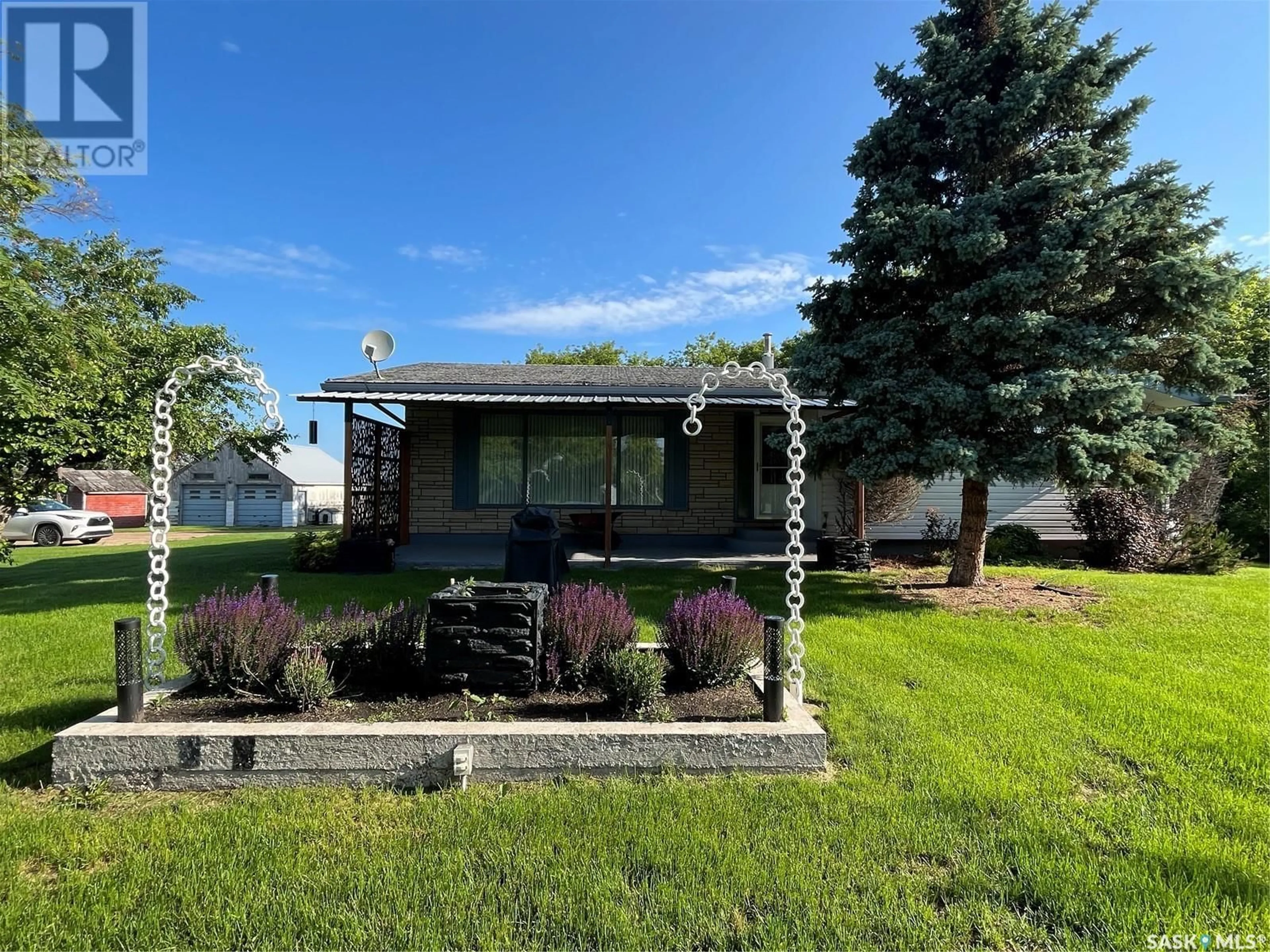 Home with vinyl exterior material, street for 12.10 BALON ACREAGE, Invergordon Rm No. 430 Saskatchewan S0K4K0