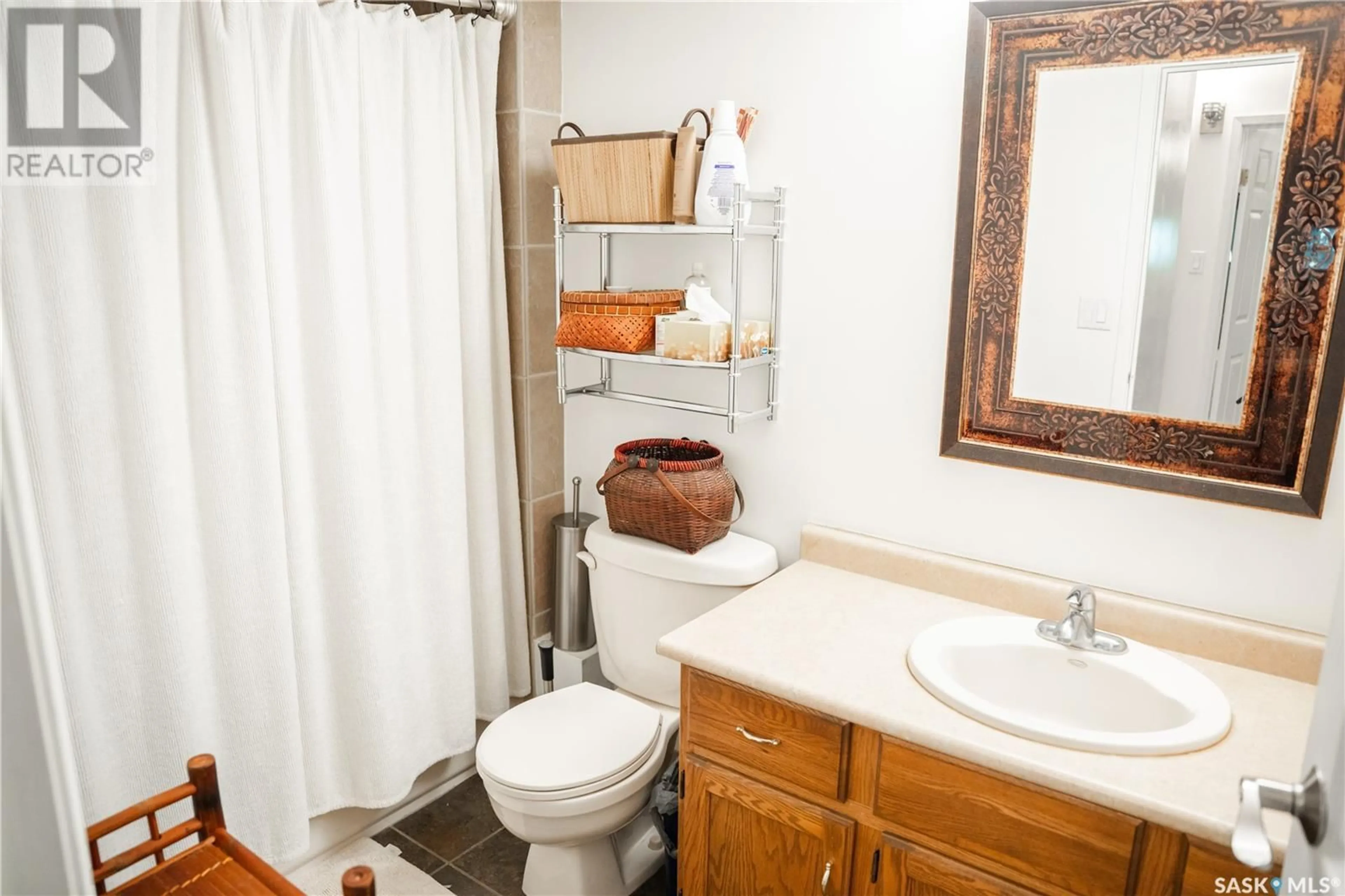 Standard bathroom, ceramic/tile floor for 103 - 2237 MCINTYRE STREET, Regina Saskatchewan S4P2S1