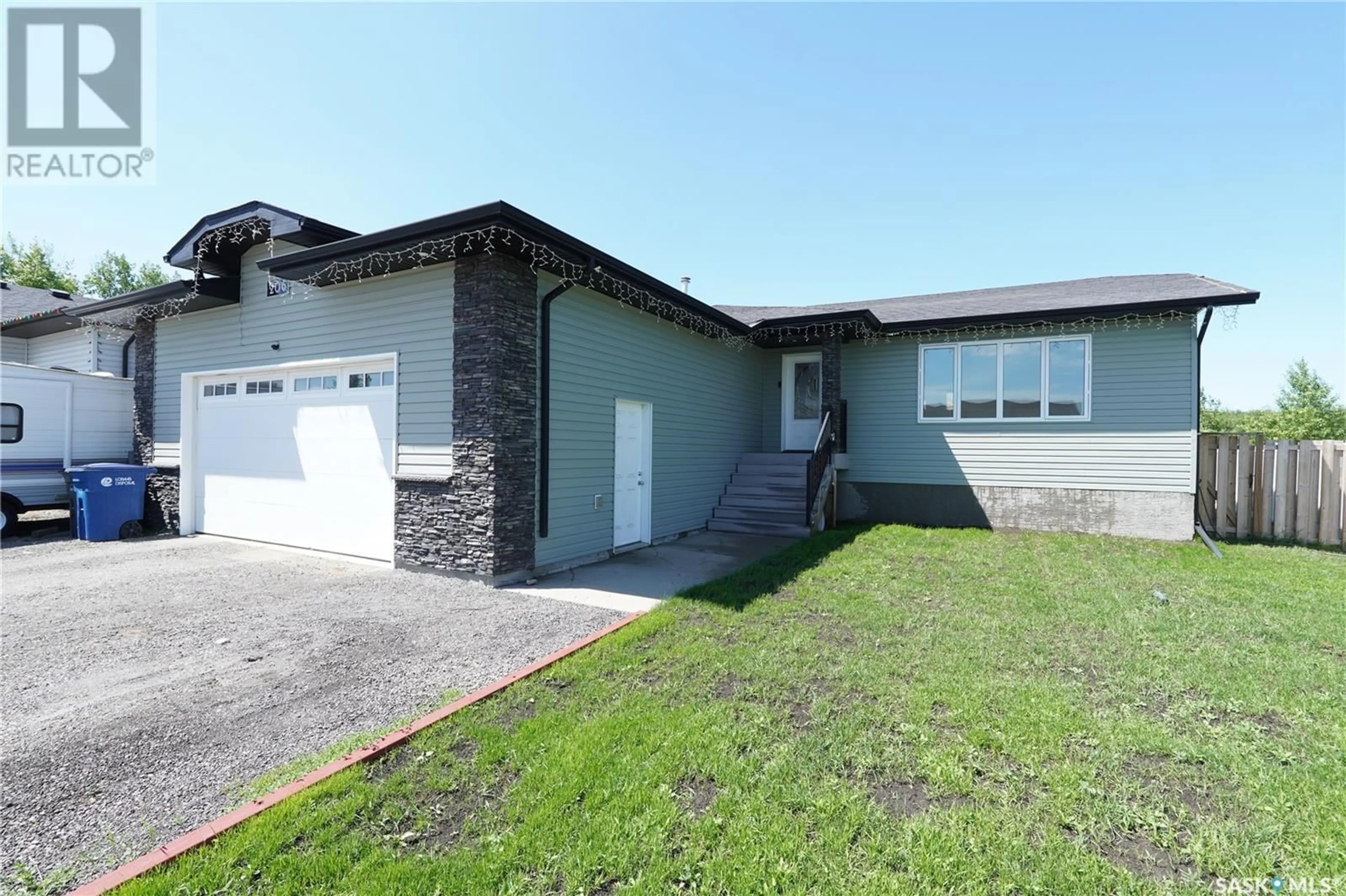 Home with vinyl exterior material, street for 206 CARTER STREET, Mclean Saskatchewan S0G3E0