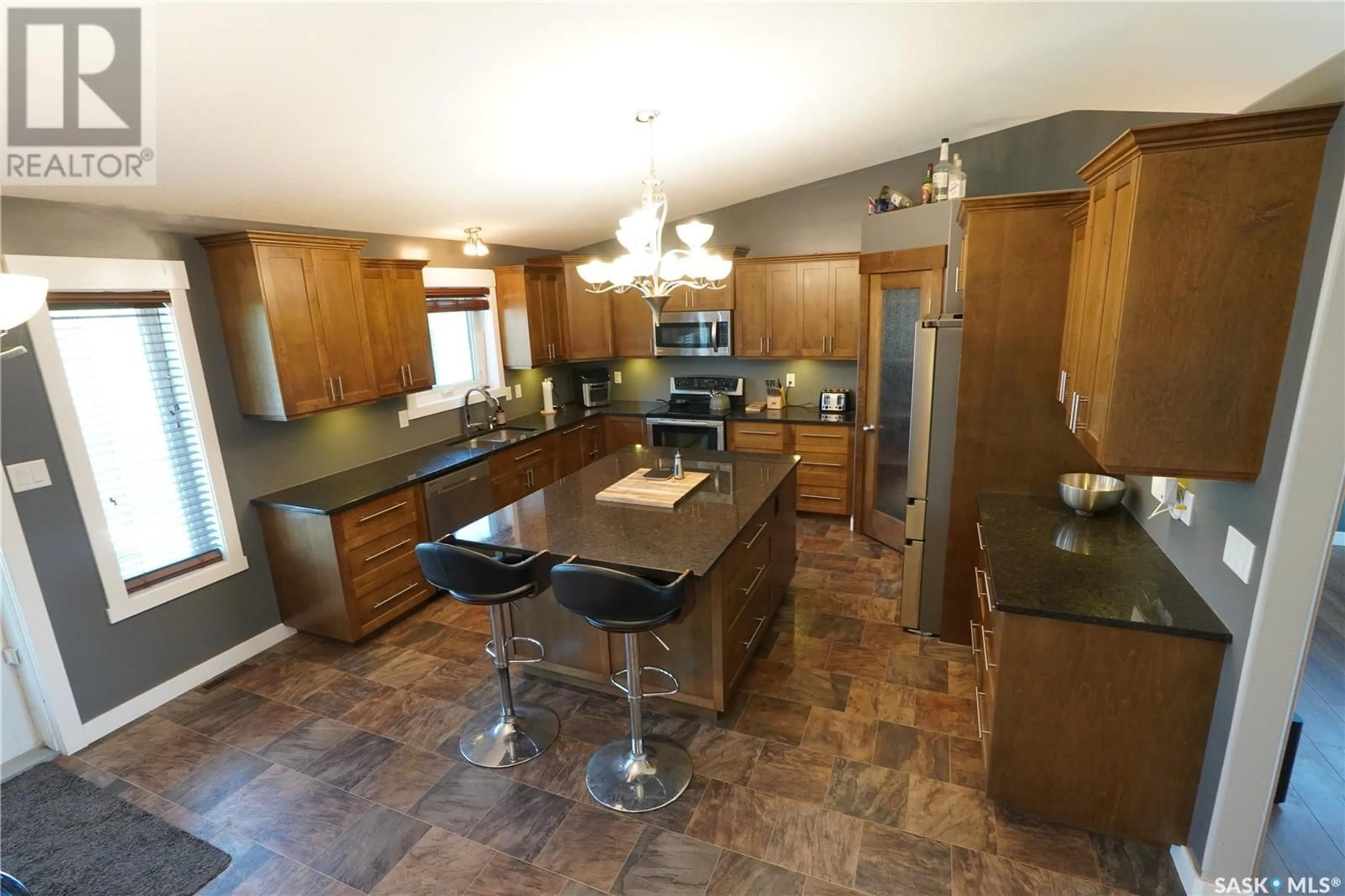 Open concept kitchen, ceramic/tile floor for 206 CARTER STREET, Mclean Saskatchewan S0G3E0
