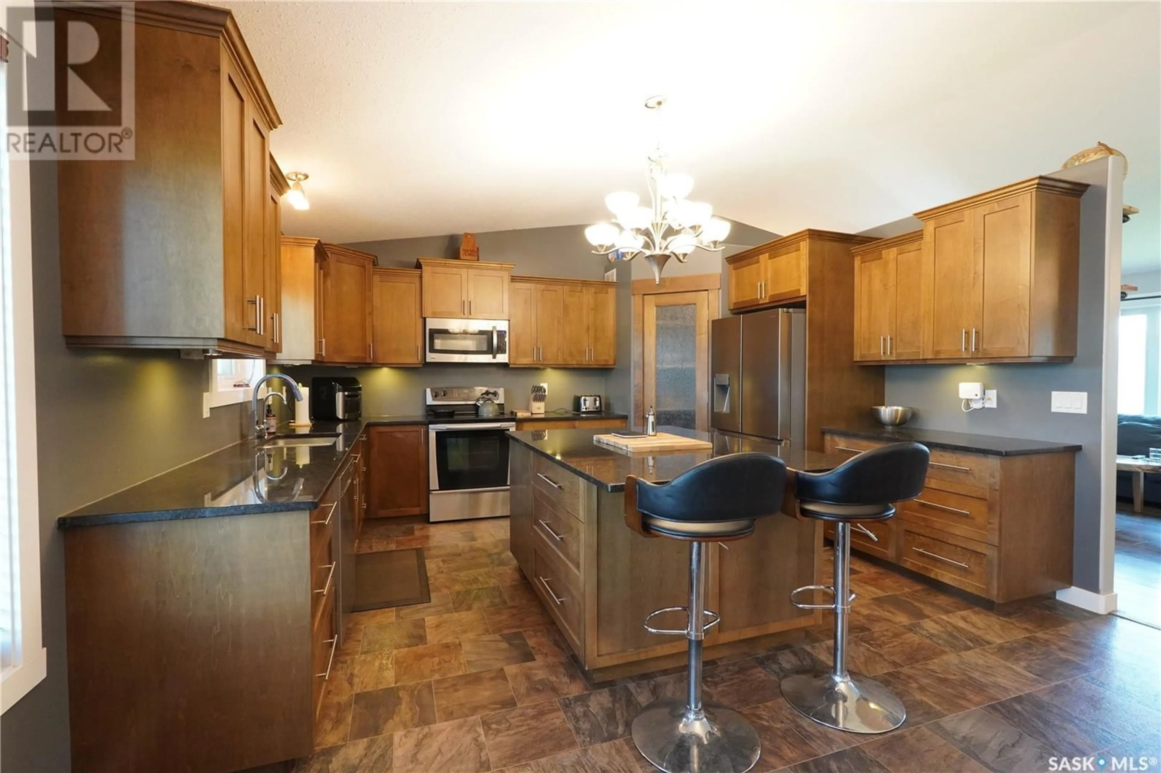 Open concept kitchen, ceramic/tile floor for 206 CARTER STREET, Mclean Saskatchewan S0G3E0