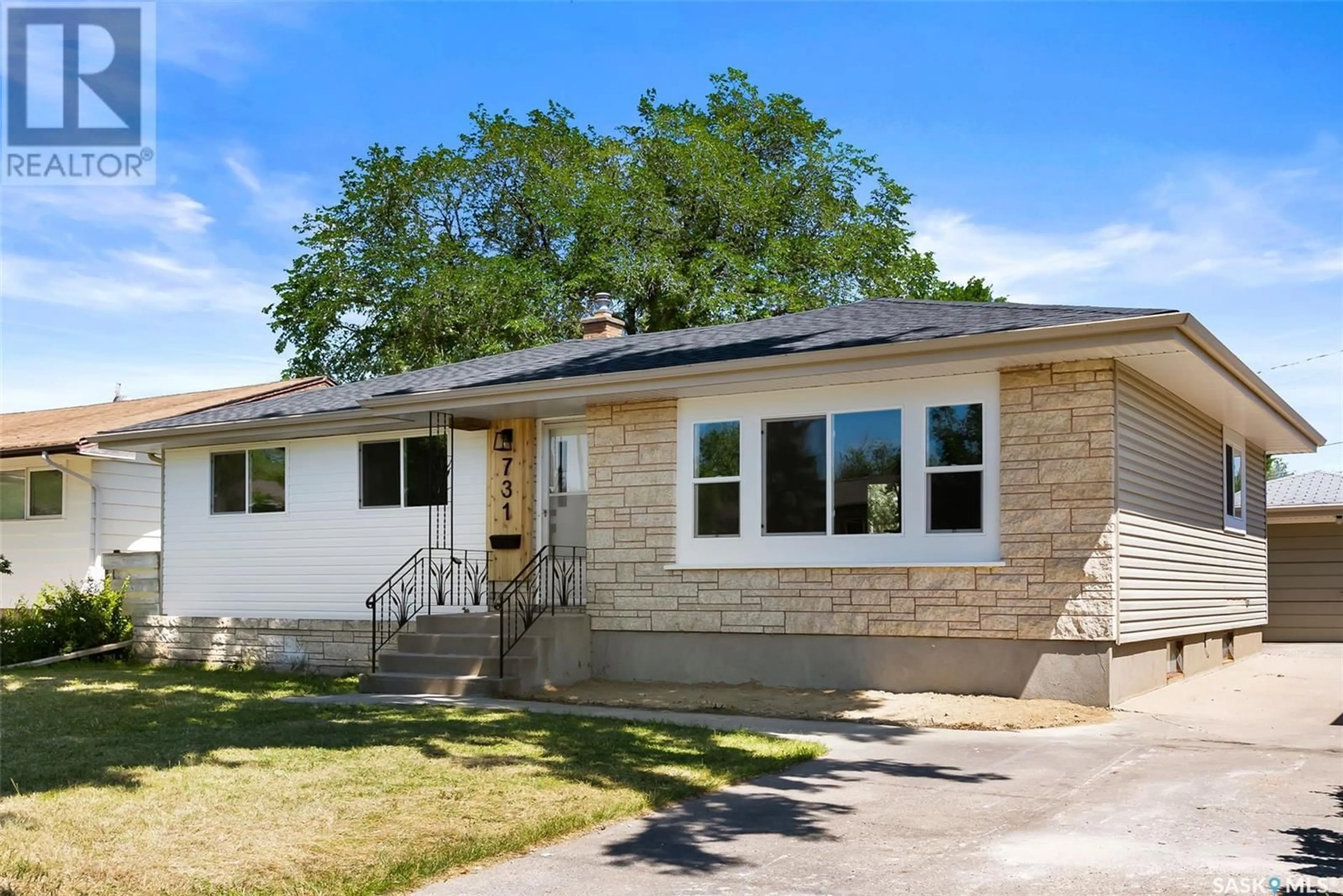 Home with vinyl exterior material, street for 731 CONNAUGHT STREET, Regina Saskatchewan S4T4S5