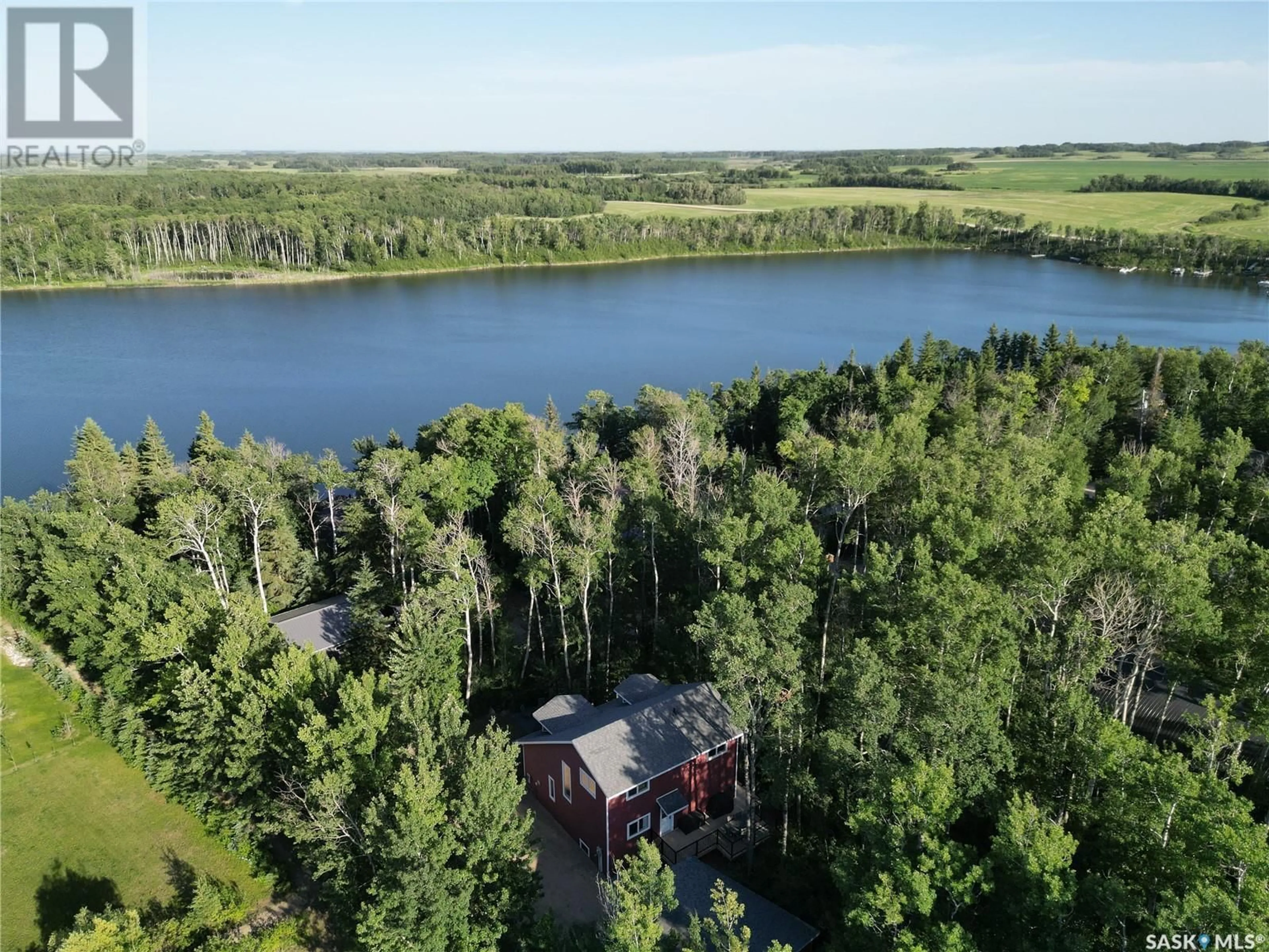 A pic from outside/outdoor area/front of a property/back of a property/a pic from drone, water/lake/river/ocean view for 116 WHITE BIRCH DRIVE, Three Lakes Rm No. 400 Saskatchewan S0K2X0