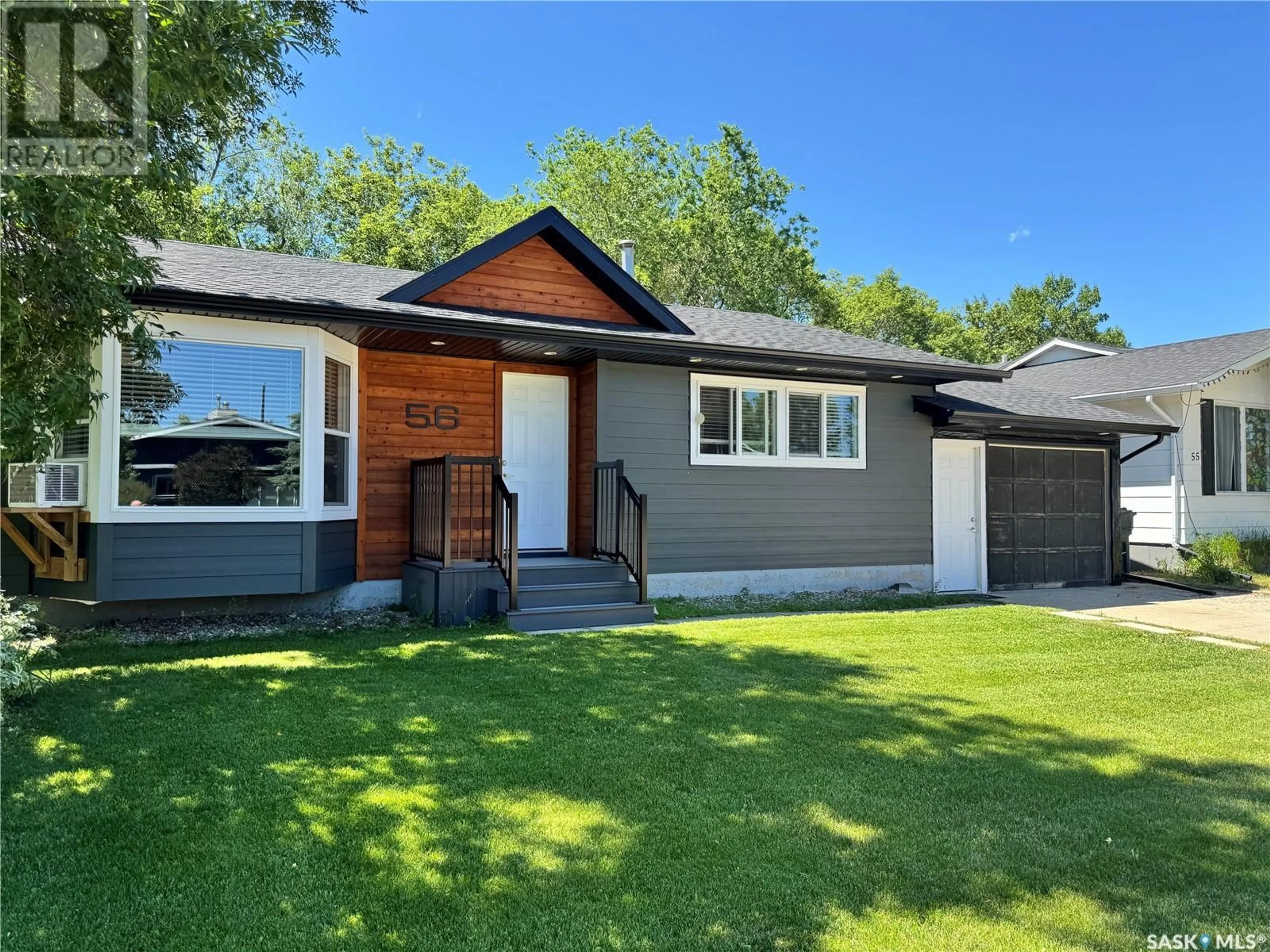 Home with vinyl exterior material, street for 56 CAMPBELL PLACE, Clavet Saskatchewan S0K0Y0
