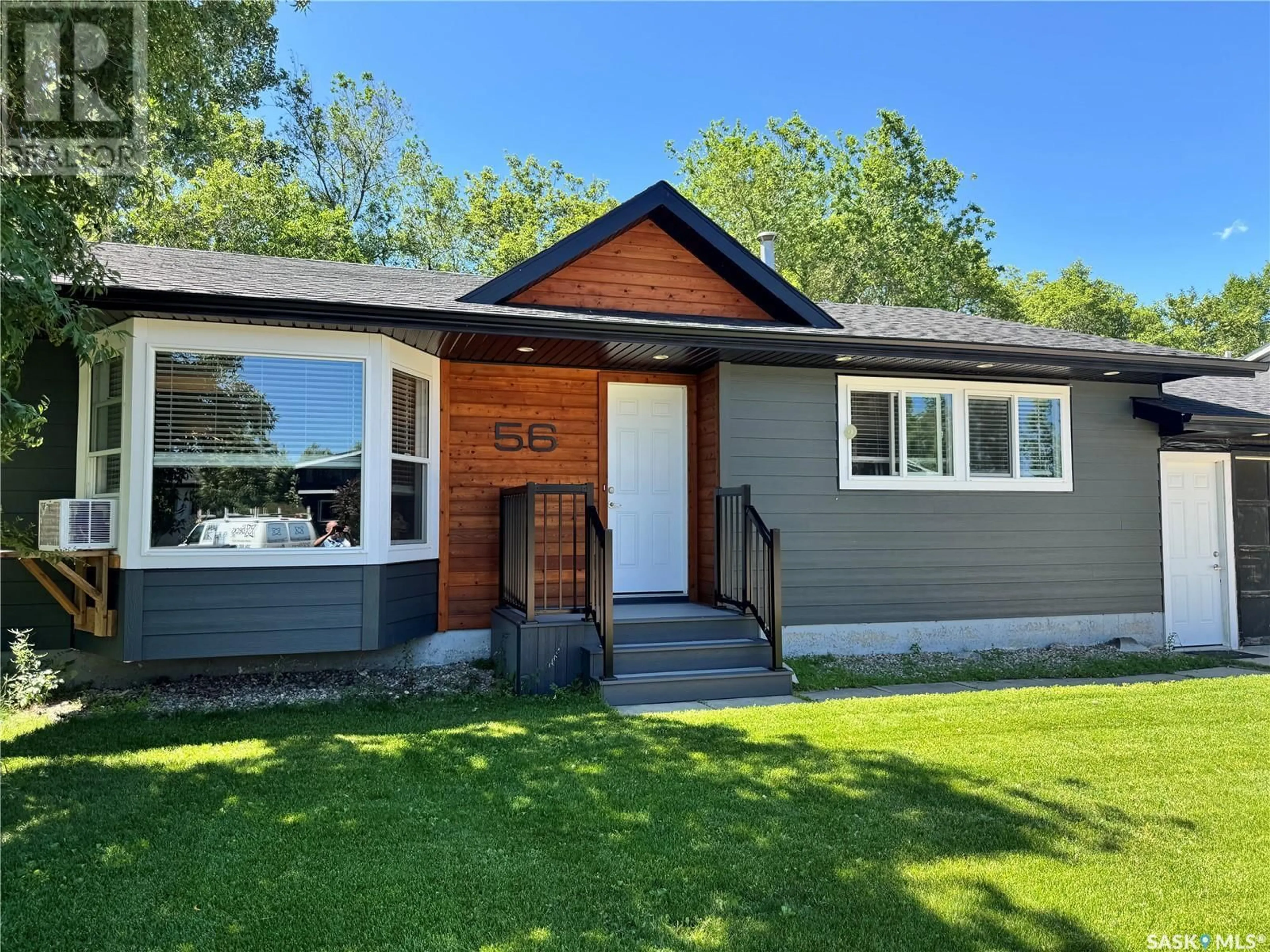 Home with vinyl exterior material, street for 56 CAMPBELL PLACE, Clavet Saskatchewan S0K0Y0