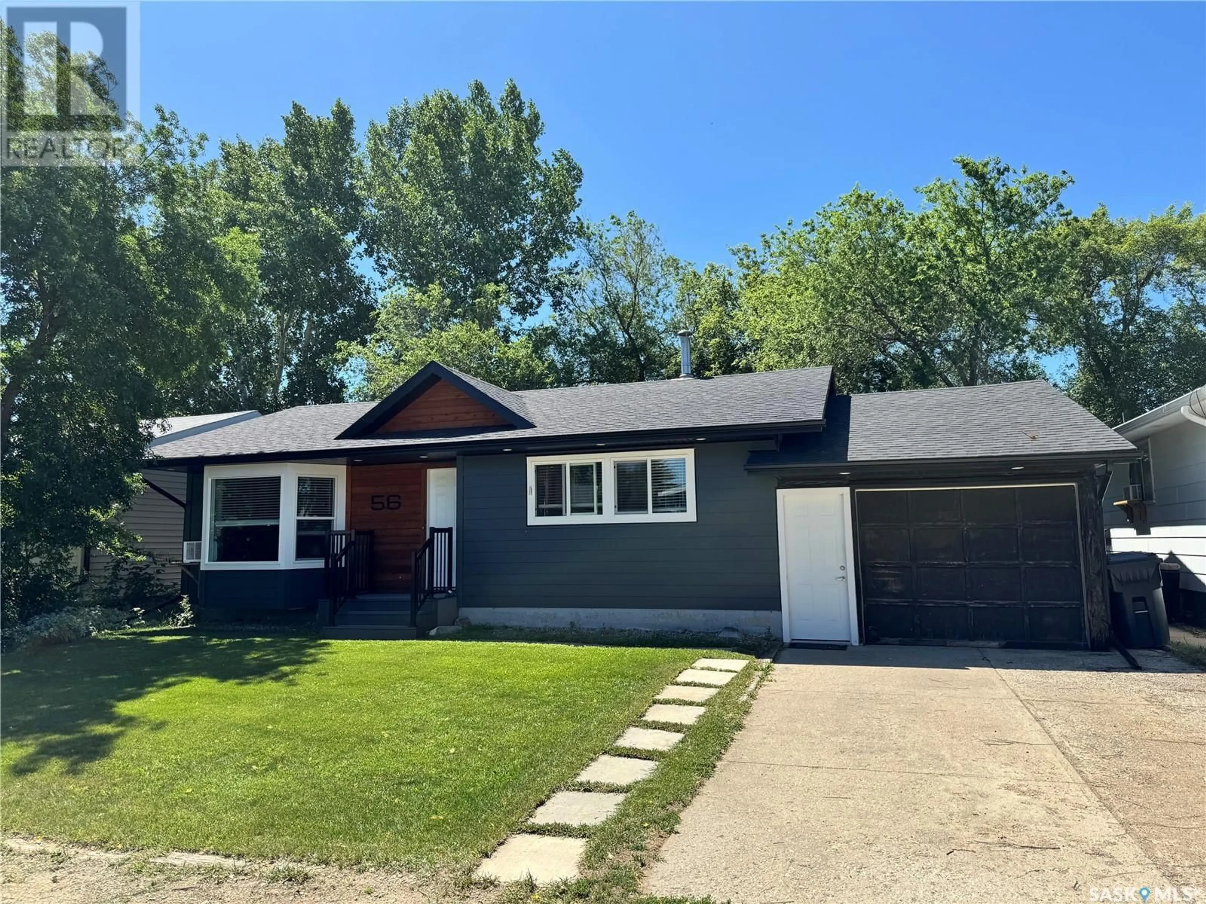 Home with vinyl exterior material, street for 56 CAMPBELL PLACE, Clavet Saskatchewan S0K0Y0