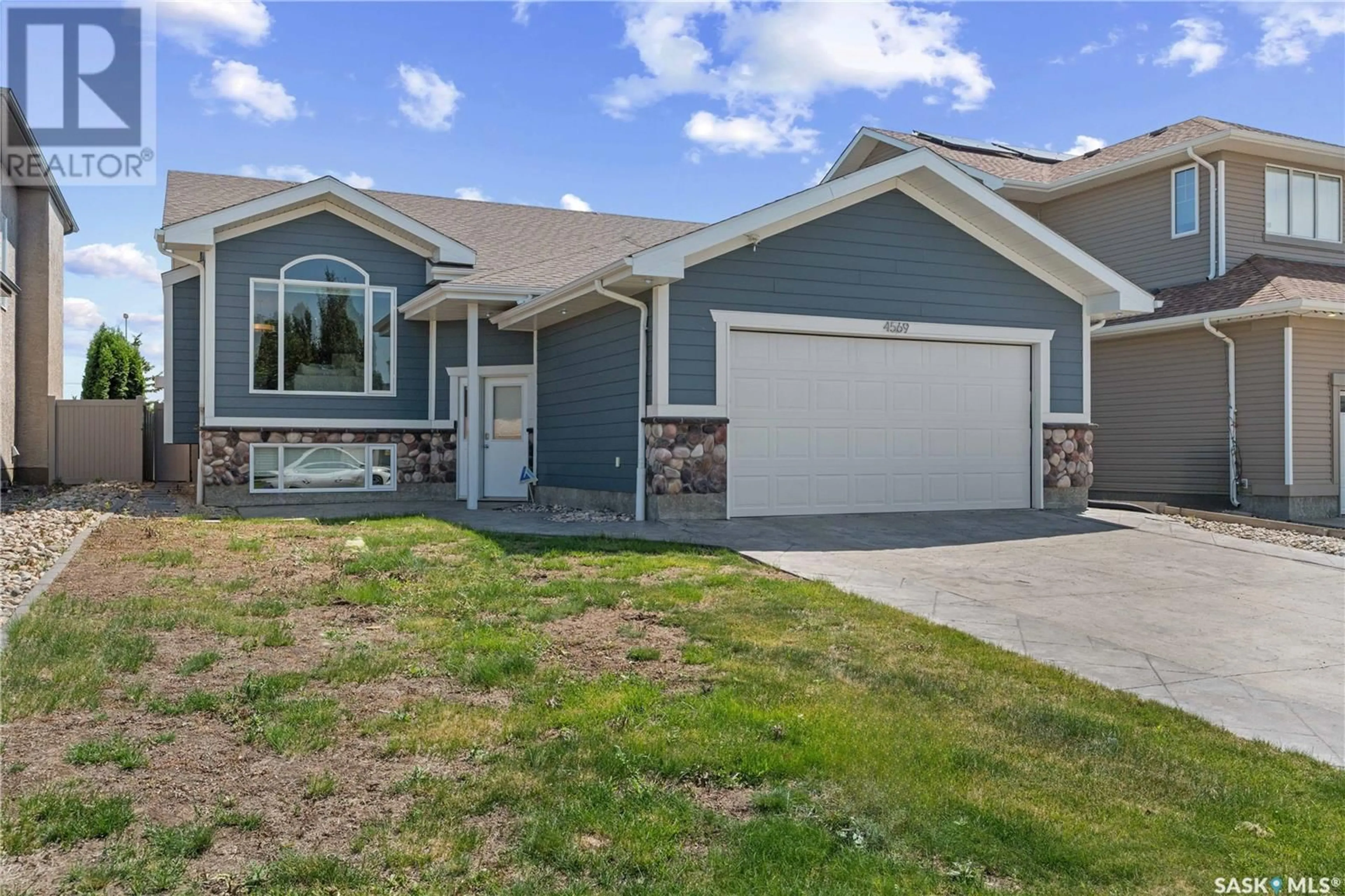 Home with vinyl exterior material, street for 4569 HAMES CRESCENT, Regina Saskatchewan S4W0B5